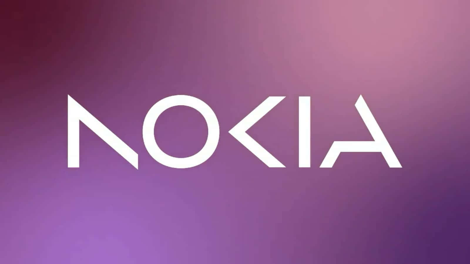諾基亞 桌布 壁紙 — 單詞 nokia 以粗體白色字母居中顯示在漸變紫色背景上。