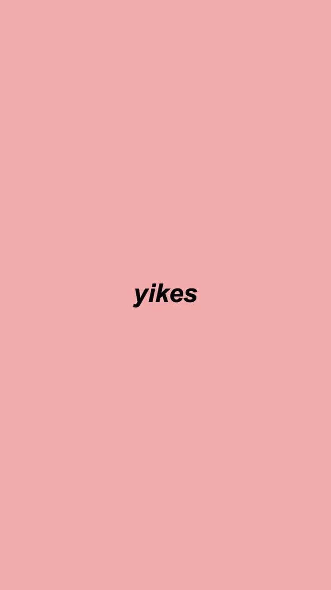 純色粉紅色背景上顯示粗體黑色文字 yikes。 — 美學字眼 壁紙