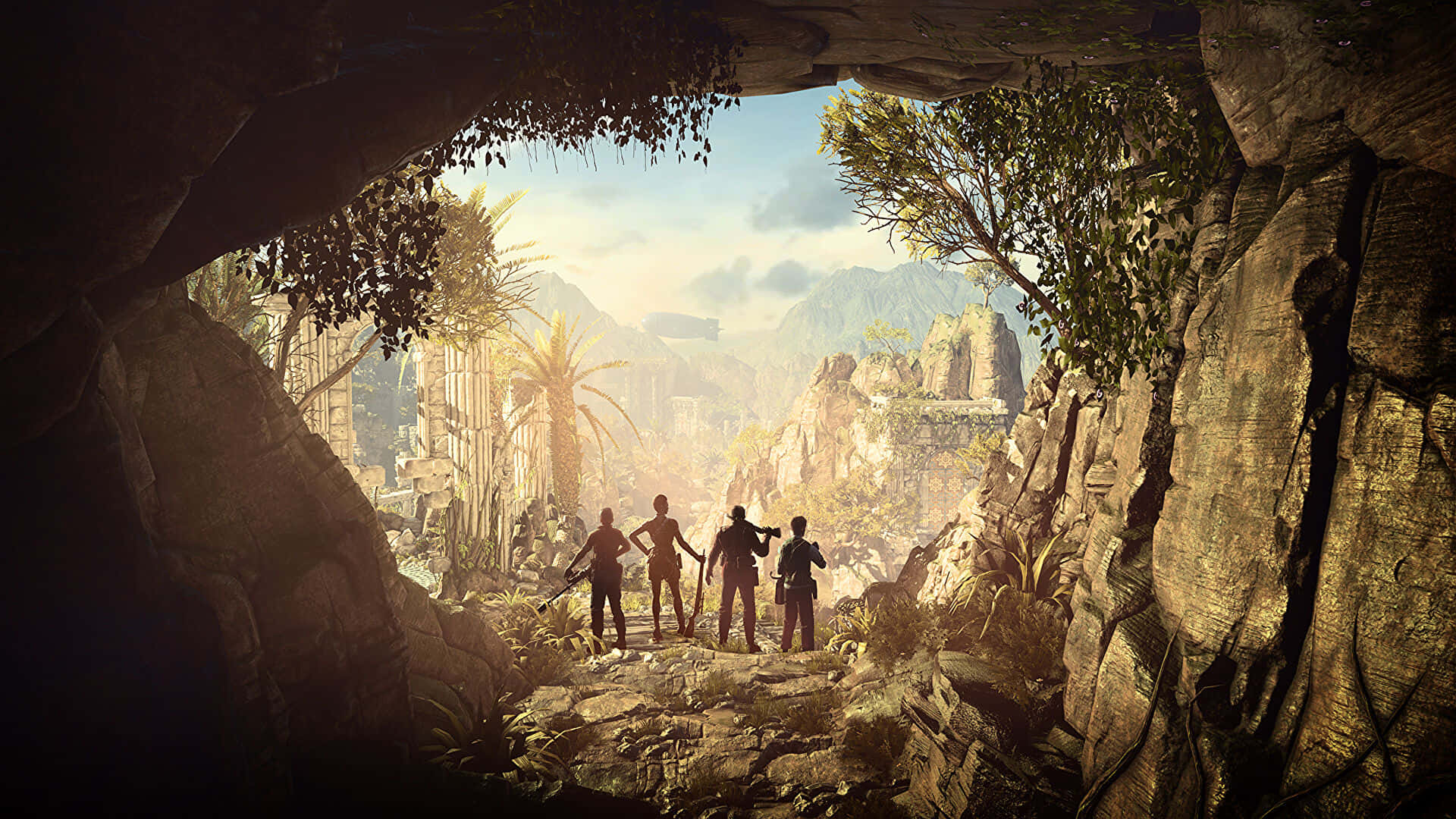 1920x1080 Strange Brigade 桌布 壁紙 — 四位冒險家站在洞穴口，凝視著陽光明媚的叢林，其中有古代遺跡和遠山。