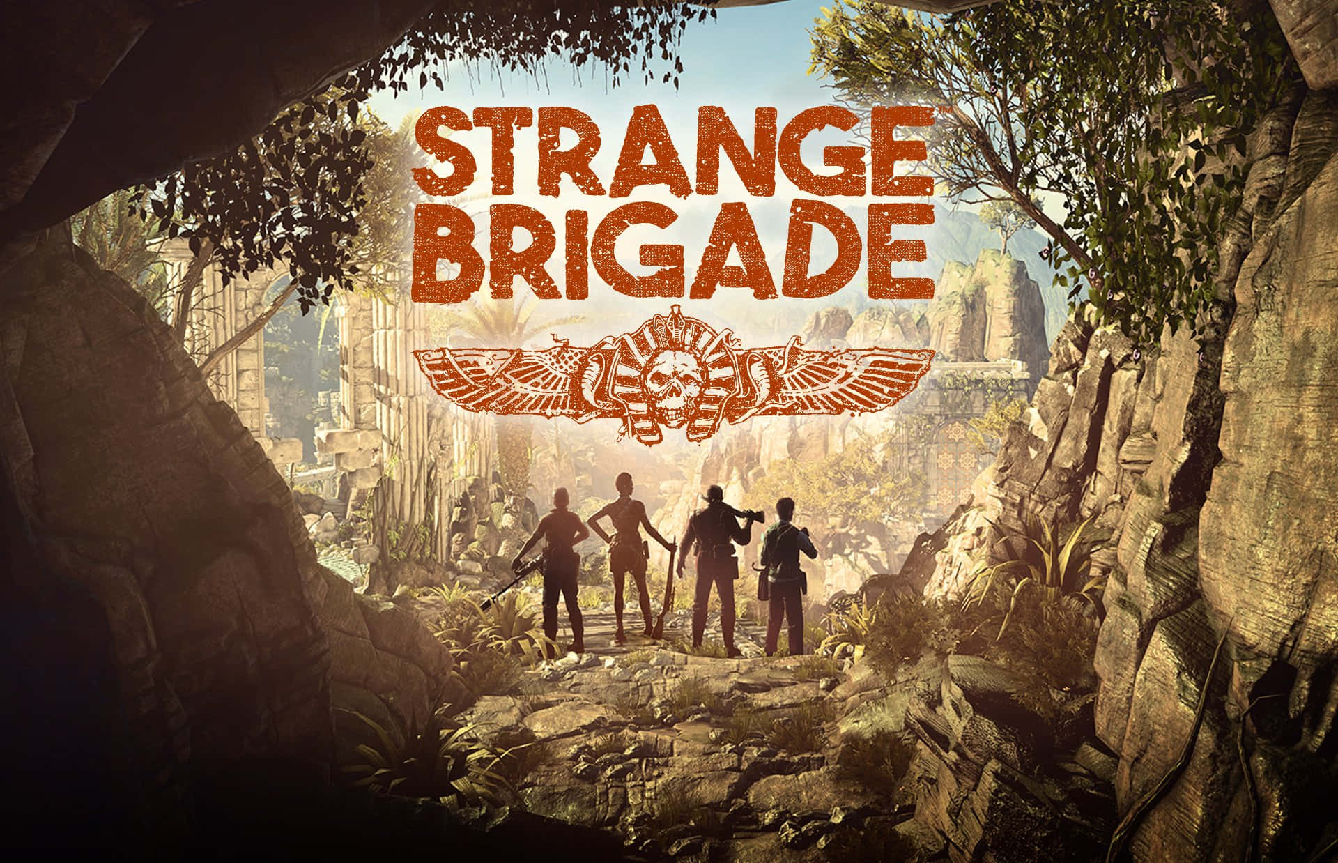 Strange Brigade 桌布 壁紙 — 四位冒險者站在洞穴入口，展現出陽光普照的叢林廢墟，內有古老石結構和茂密植被。