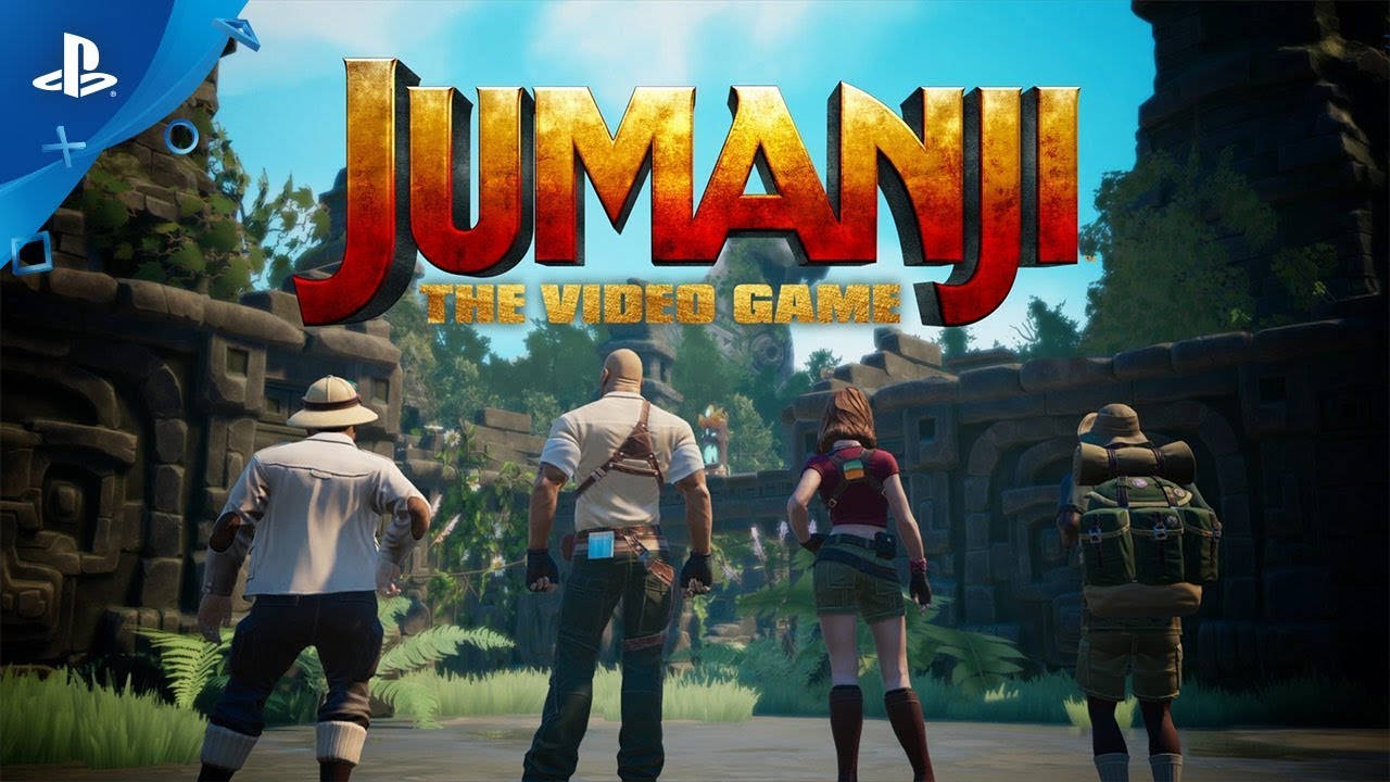 PlayStation 桌布 壁紙 — 四位冒險者站在茂密叢林中的空地上，面前是古老的石頭廢墟，上方是明亮的藍天，並有Jumanji電子遊戲標題。