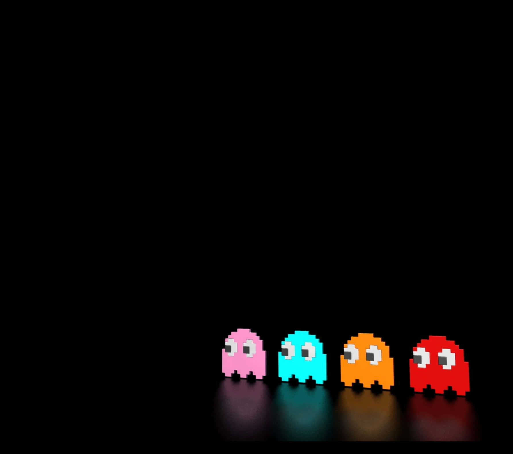 電玩遊戲 桌布 壁紙 — 四個來自 Pac-Man 的發光像素鬼魂排成一排，背景為黑色，帶有微妙的反射。