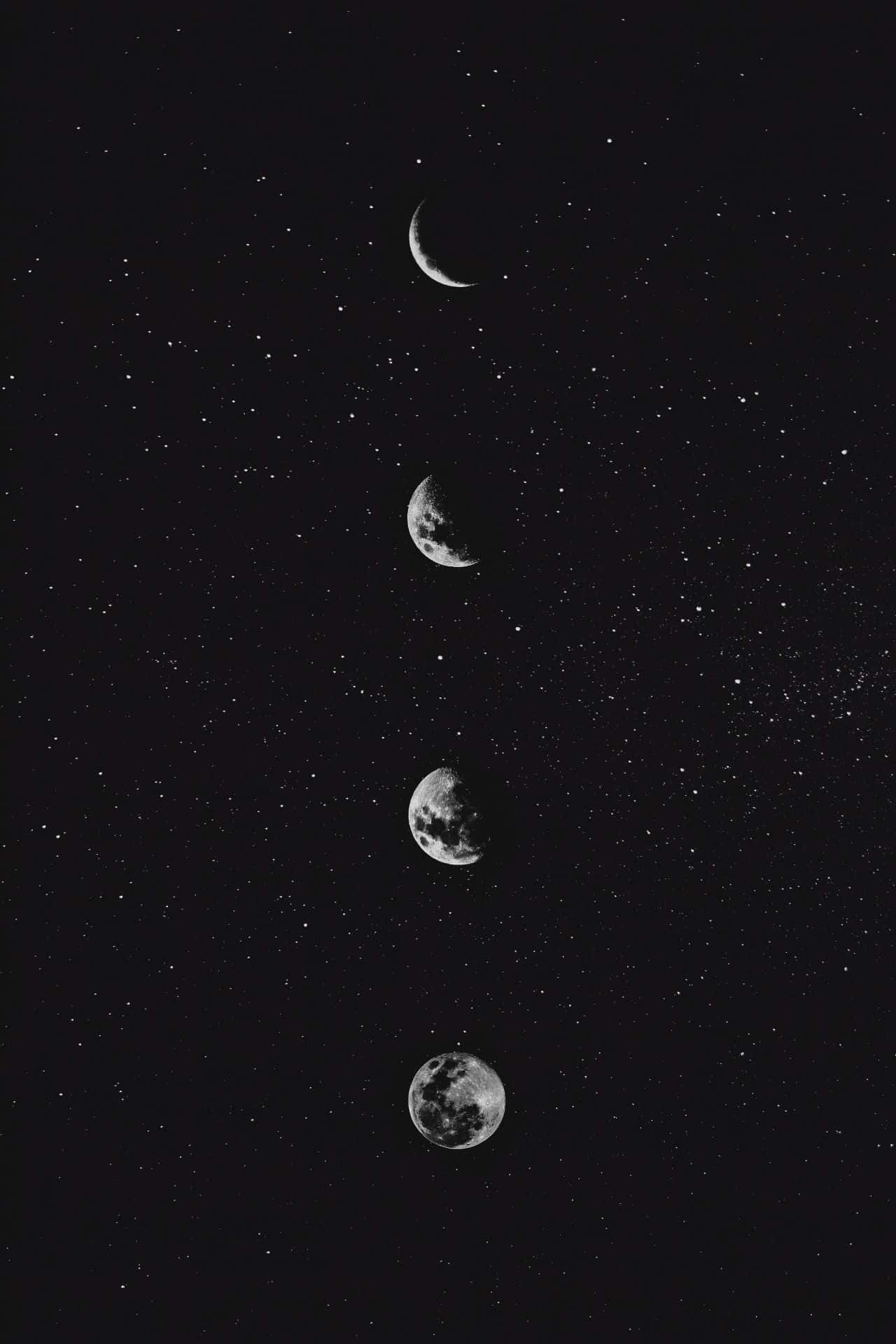 桌布 壁紙 — 四個月亮相位垂直排列，背景為單色星空夜空。