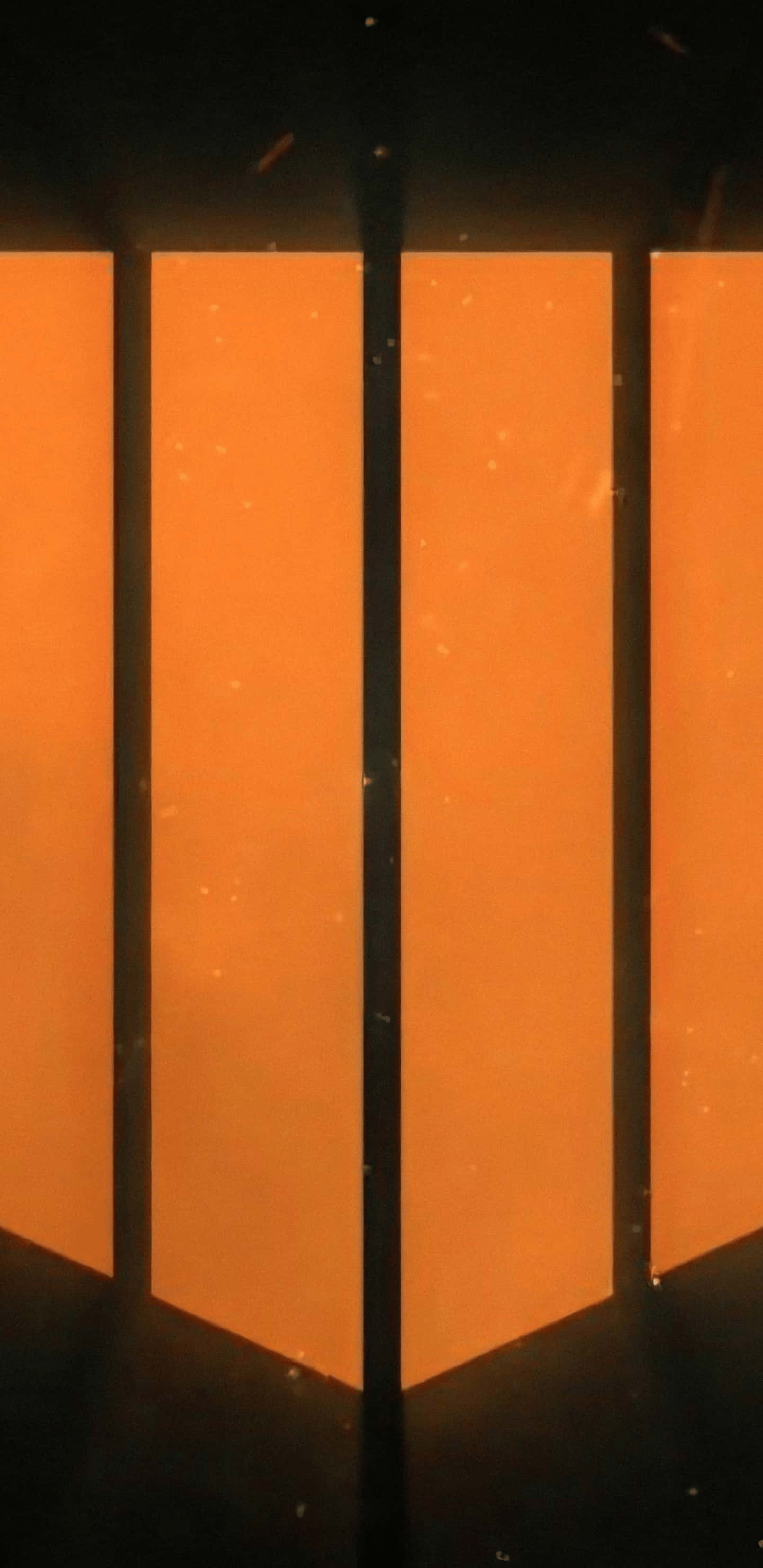 Pixel 3xl Call Of Duty Black Ops 4 桌布 壁紙 — 四個發光的橙色面板垂直立在黑暗背景上，帶有浮動粒子。