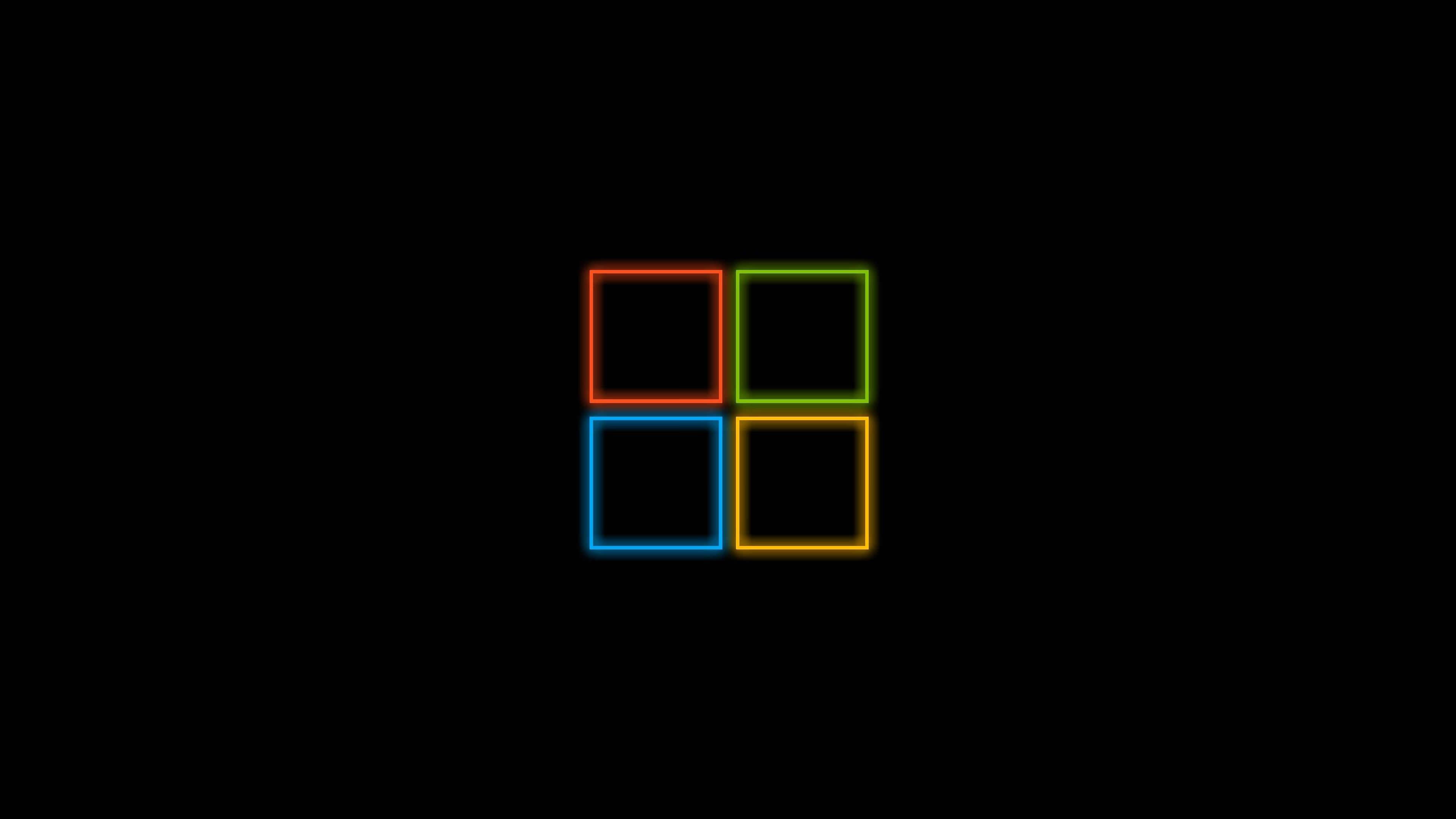 Dark Windows 桌布 壁紙 — 四個發光霓虹方形（紅、綠、藍、黃）在黑色背景上形成網格。