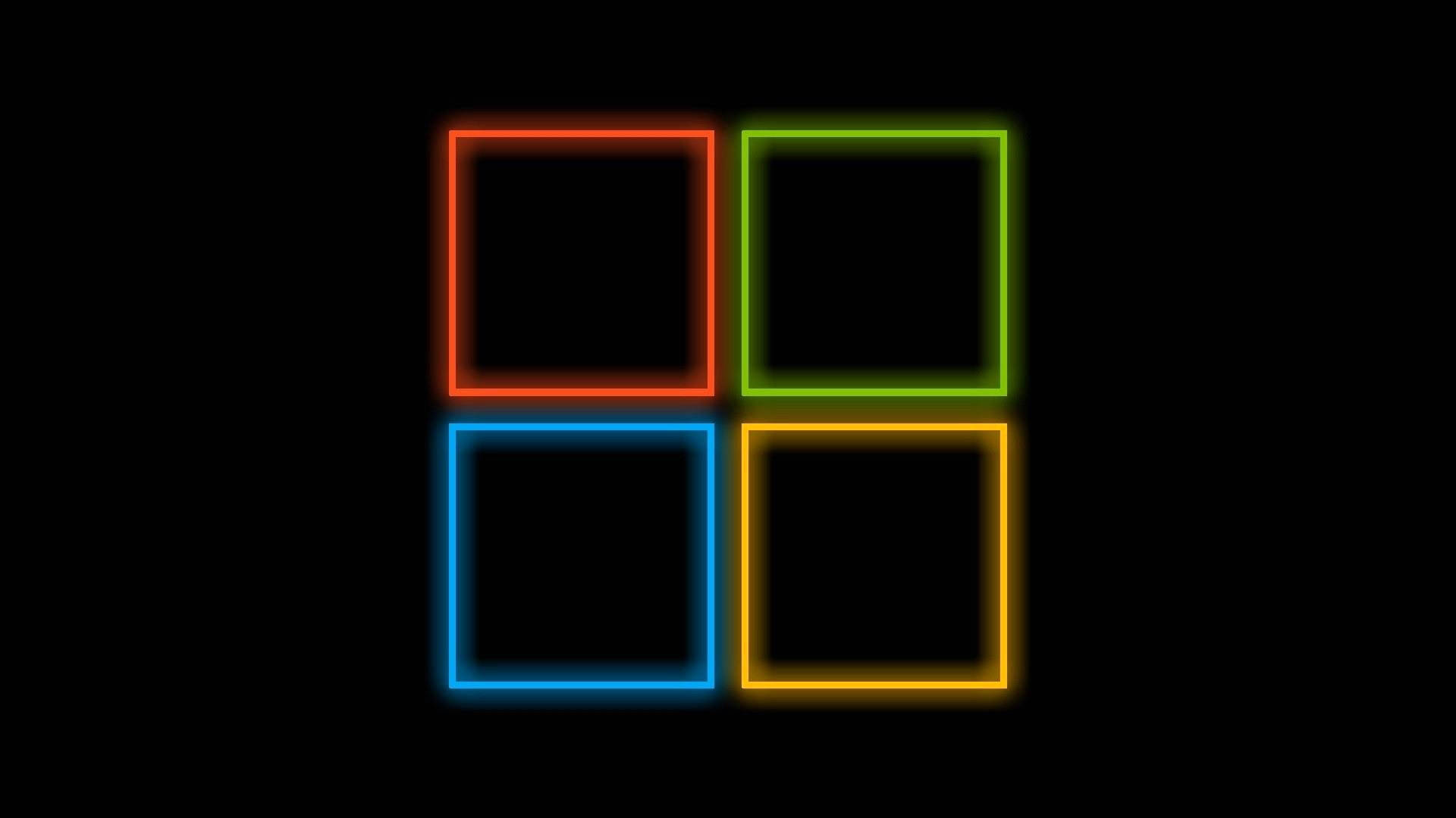 黑色 Windows 10 桌布 壁紙 — 四個發光霓虹方形（紅色、綠色、藍色和黃色）在黑色背景上形成網格。