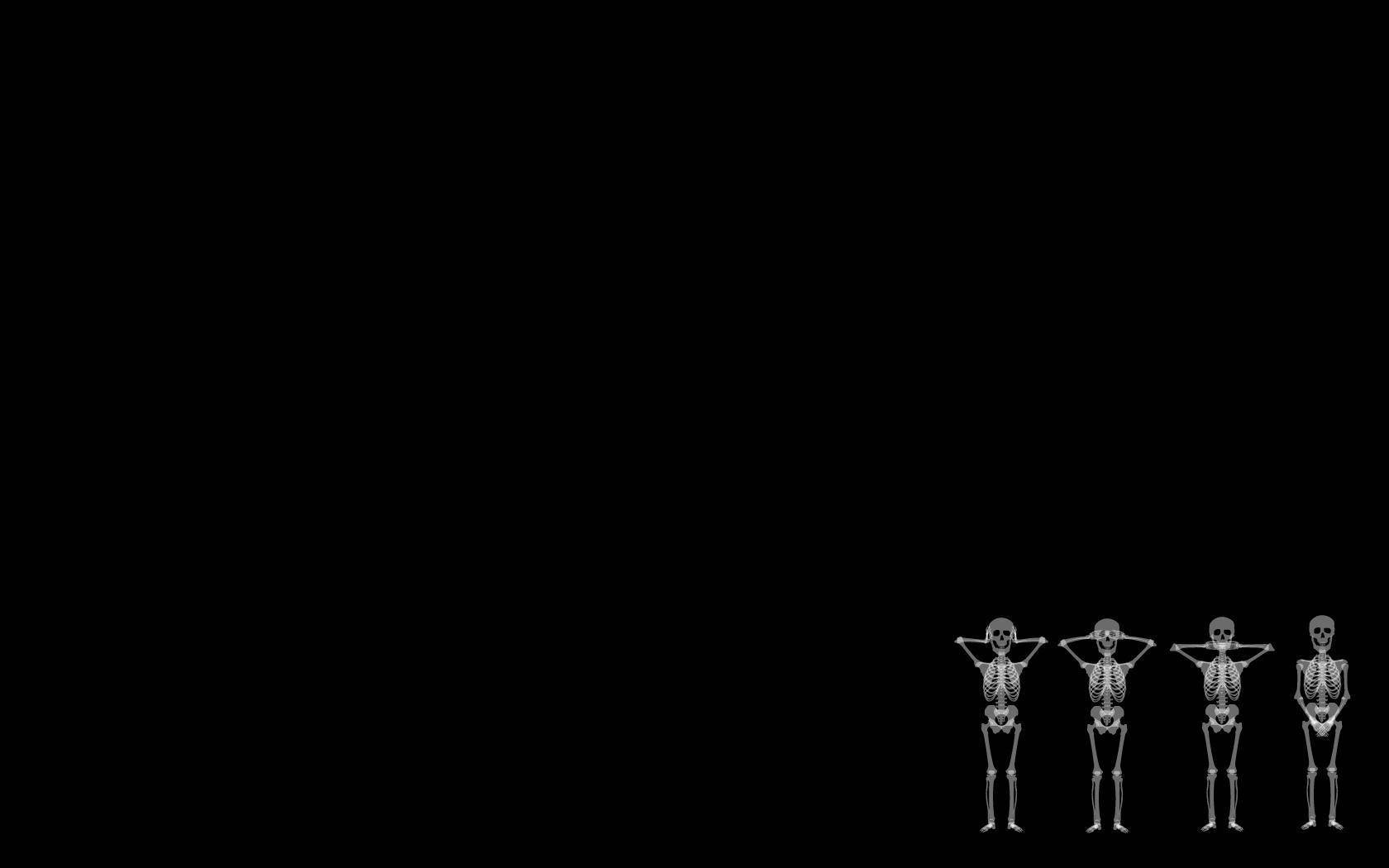 Cute Skeleton 桌布 壁紙 — 四個白色骷髏在黑色背景前站成一排，每個姿勢都不同。