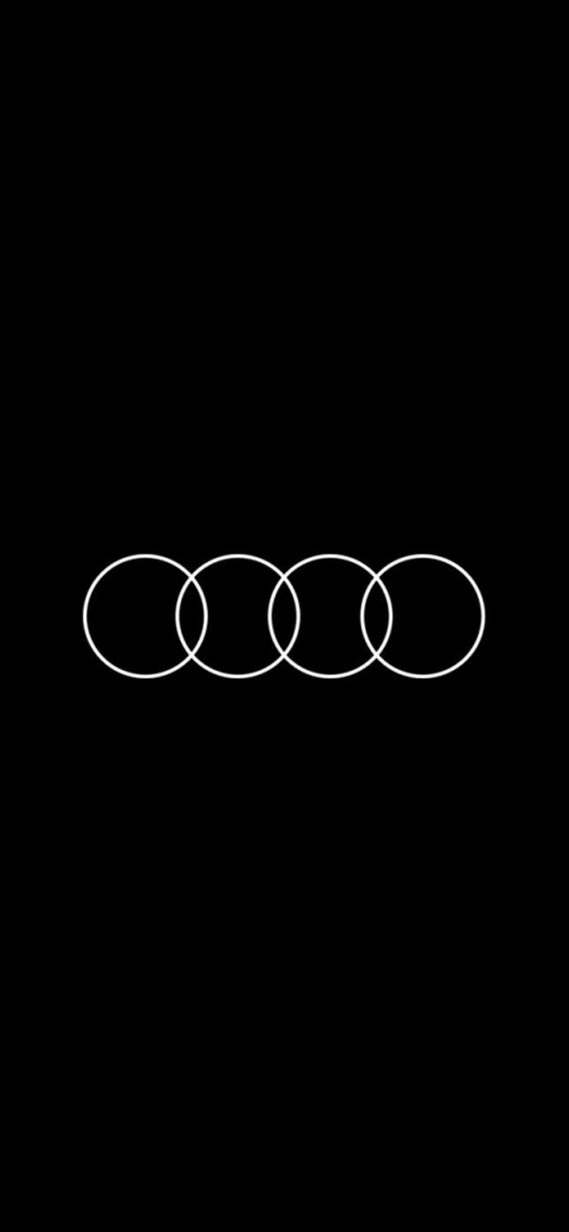 Audi iPhone 桌布 壁紙 — 四個相互交織的白色圓環居中於純黑色背景上的極簡標誌設計。