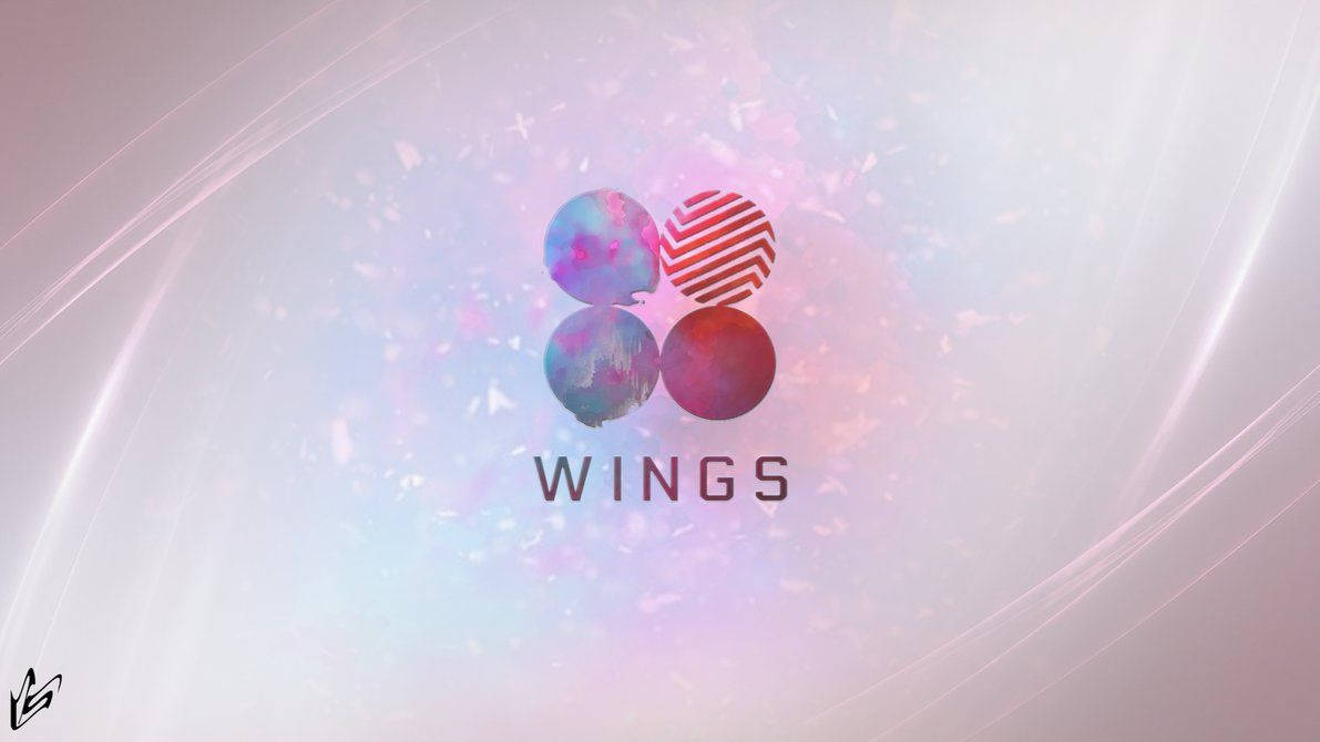 BTS 桌布 壁紙 — 四個色彩繽紛的球體排列成翅膀形狀，漂浮在發光的宇宙背景中，帶有光線條紋和漂浮粒子。