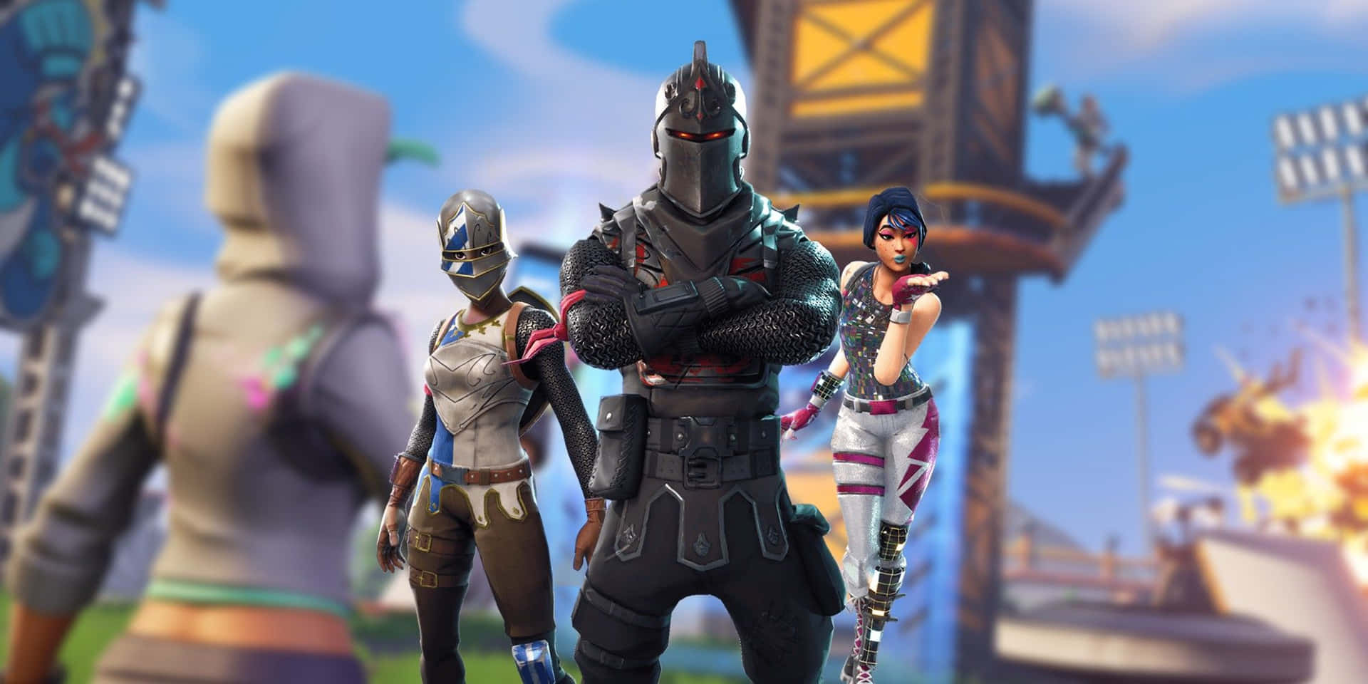 Creative Mode 桌布 壁紙 — 四個身穿戰鬥裝備的《Fortnite》角色自信地站在充滿爆炸和體育場燈光的活力遊戲競技場中。