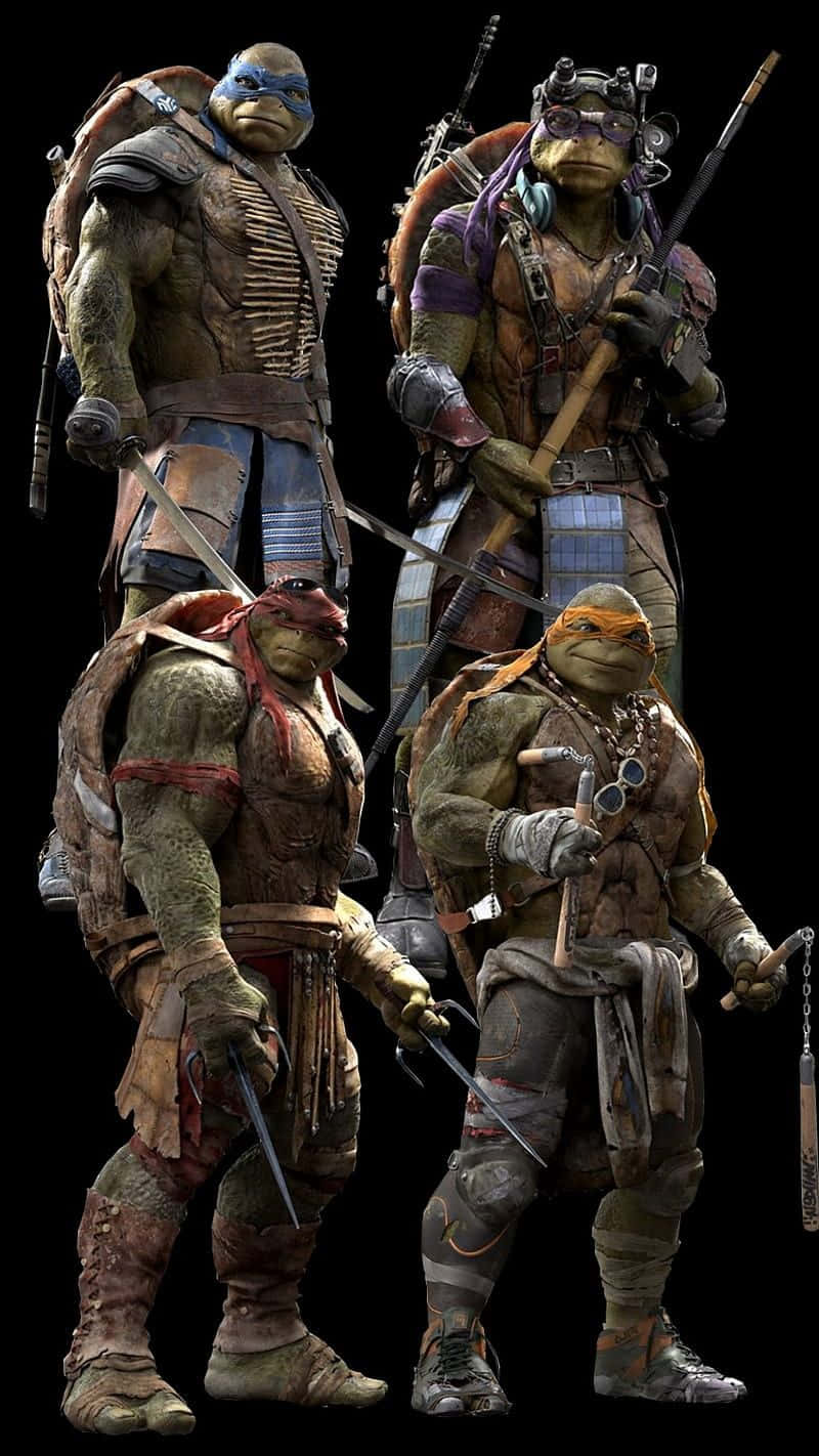 Teenage Mutant Ninja Turtles Comic Book 桌布 壁紙 — 四隻裝甲突變龜以動態姿勢站立，手持武器，背景為黑色。