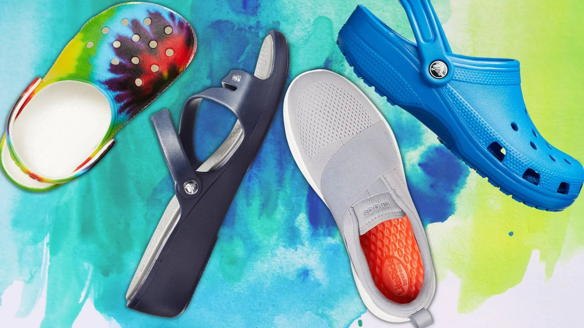 Crocs 桌布 壁紙 — 四雙色彩繽紛的Crocs鞋排列在充滿活力的水彩背景上，背景為青綠色和黃色。