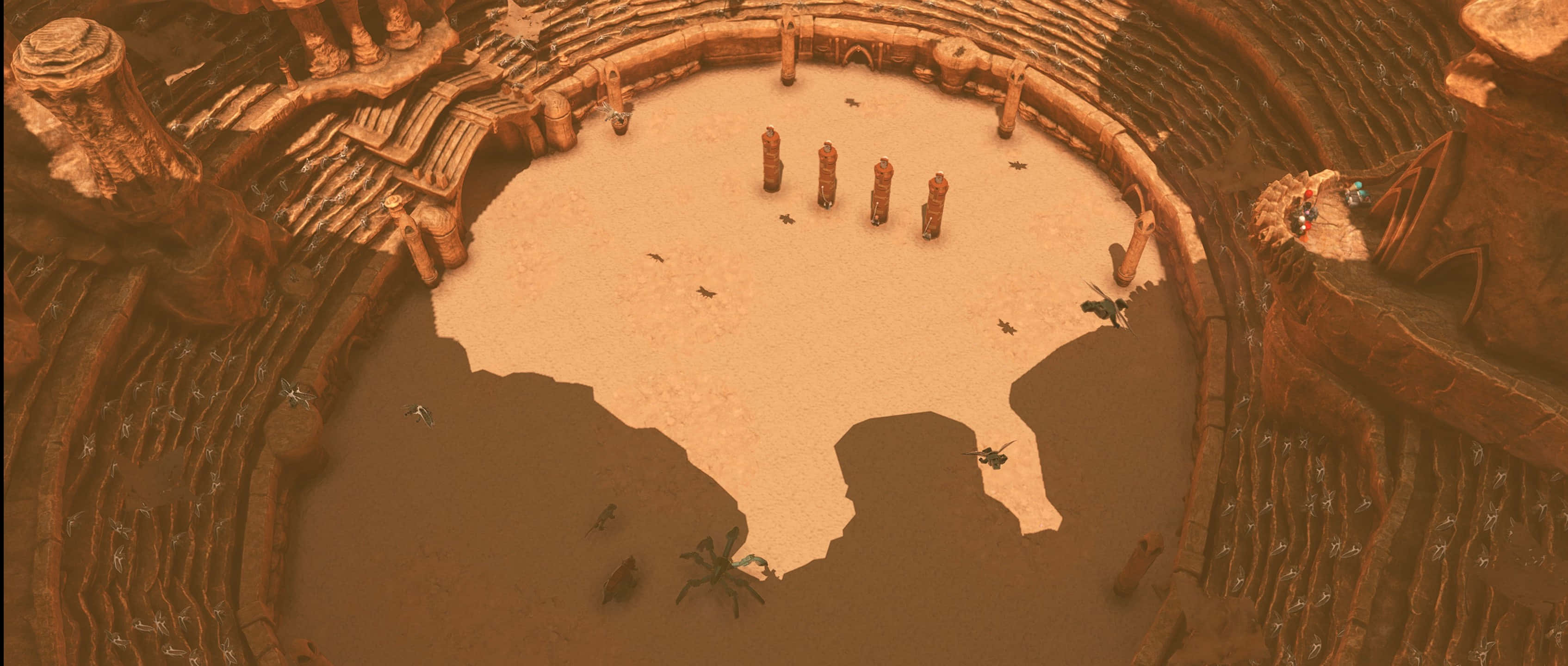 The Geonosian Arena 桌布 壁紙 — 圓形沙漠遺址的鳥瞰圖，有豎立的石柱和小人物探索這片古蹟。