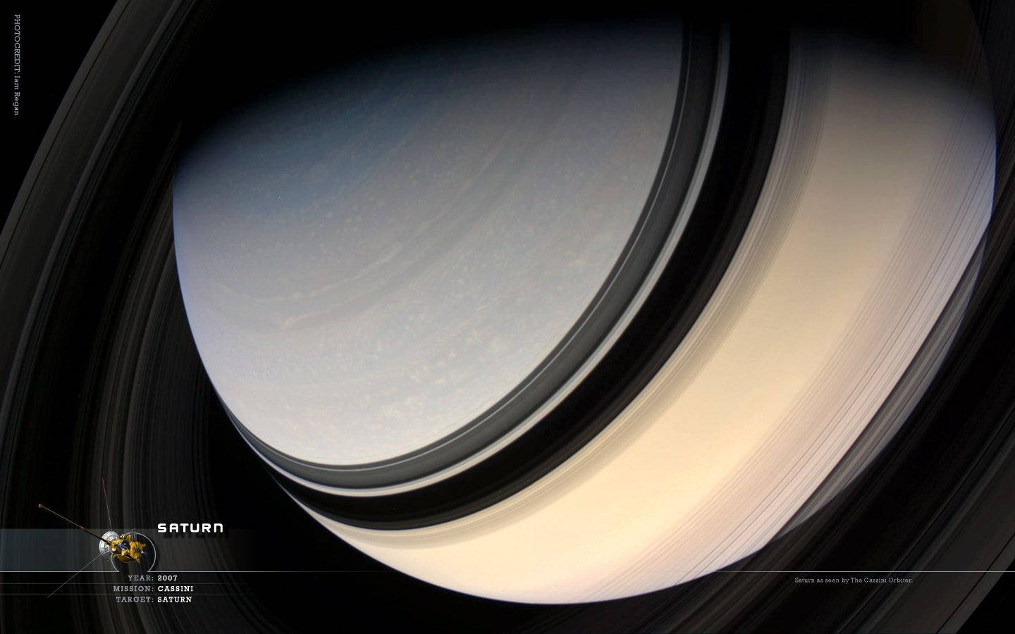 土星 桌布 壁紙 — 土星標誌性光環的特寫視圖，在太空的黑暗中柔和發光，行星表面可見微妙的氣帶。