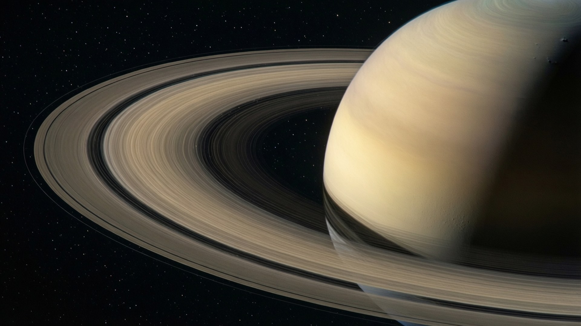 土星環 壁紙 — 土星的壯麗景象，其複雜的環系統在星空虛空中柔和發光。
