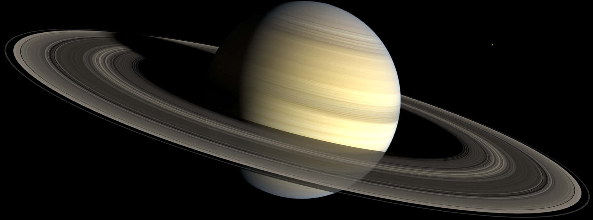Ringed Planet 桌布 壁紙 — 土星的壯麗景觀，其標誌性光環在太空的黑暗中柔和發光。