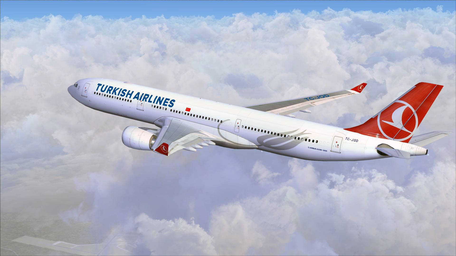 雲朵 桌布 壁紙 — 土耳其航空的空中巴士在晴朗的藍天下，優雅地滑翔在蓬鬆的白雲海上。