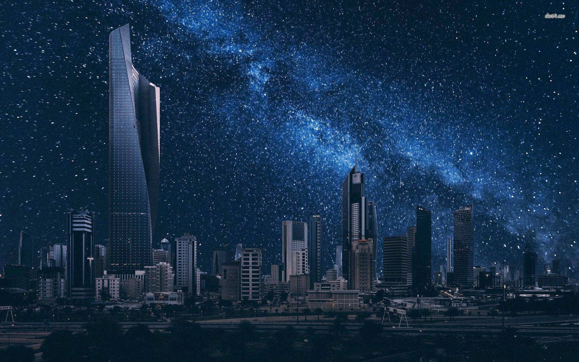 Kuwait 桌布 壁紙 — 在充滿活力的藍色星空下，銀河拱起，未來主義的城市天際線。