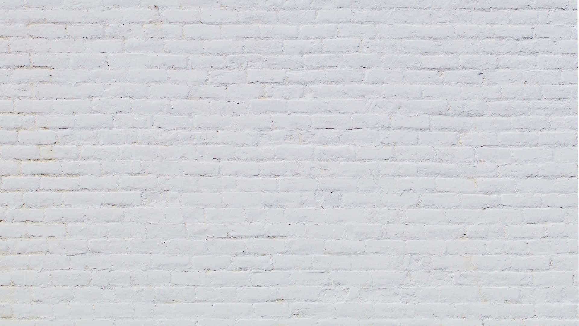 White Brick 桌布 壁紙 — 在均勻照明下，帶有細微紋理和砂漿線的清潔白色磚牆。