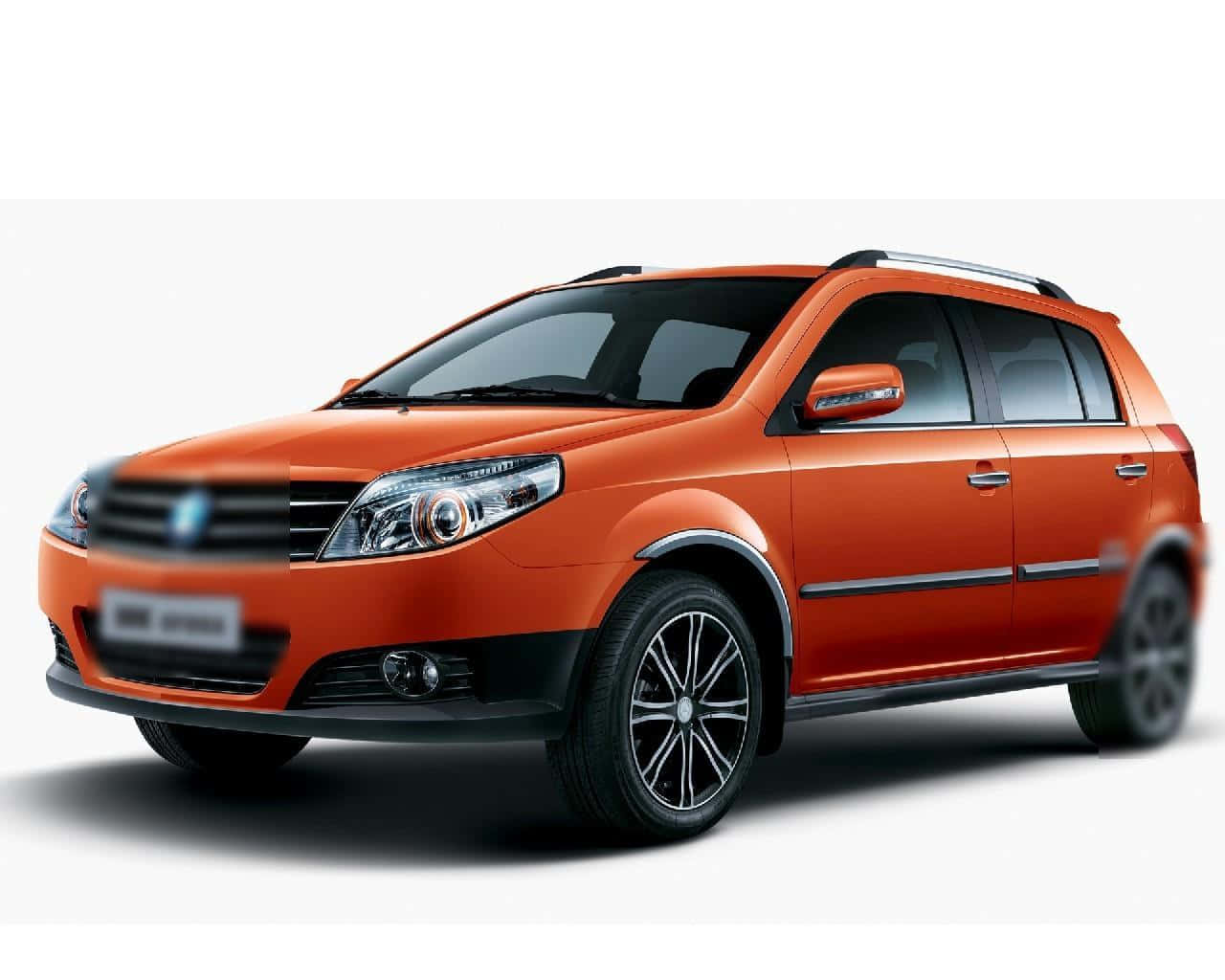 Geely 桌布 壁紙 — 在工作室燈光下展示的充滿活力的橙色緊湊型SUV，帶有黑色飾條和銀色車頂行李架。