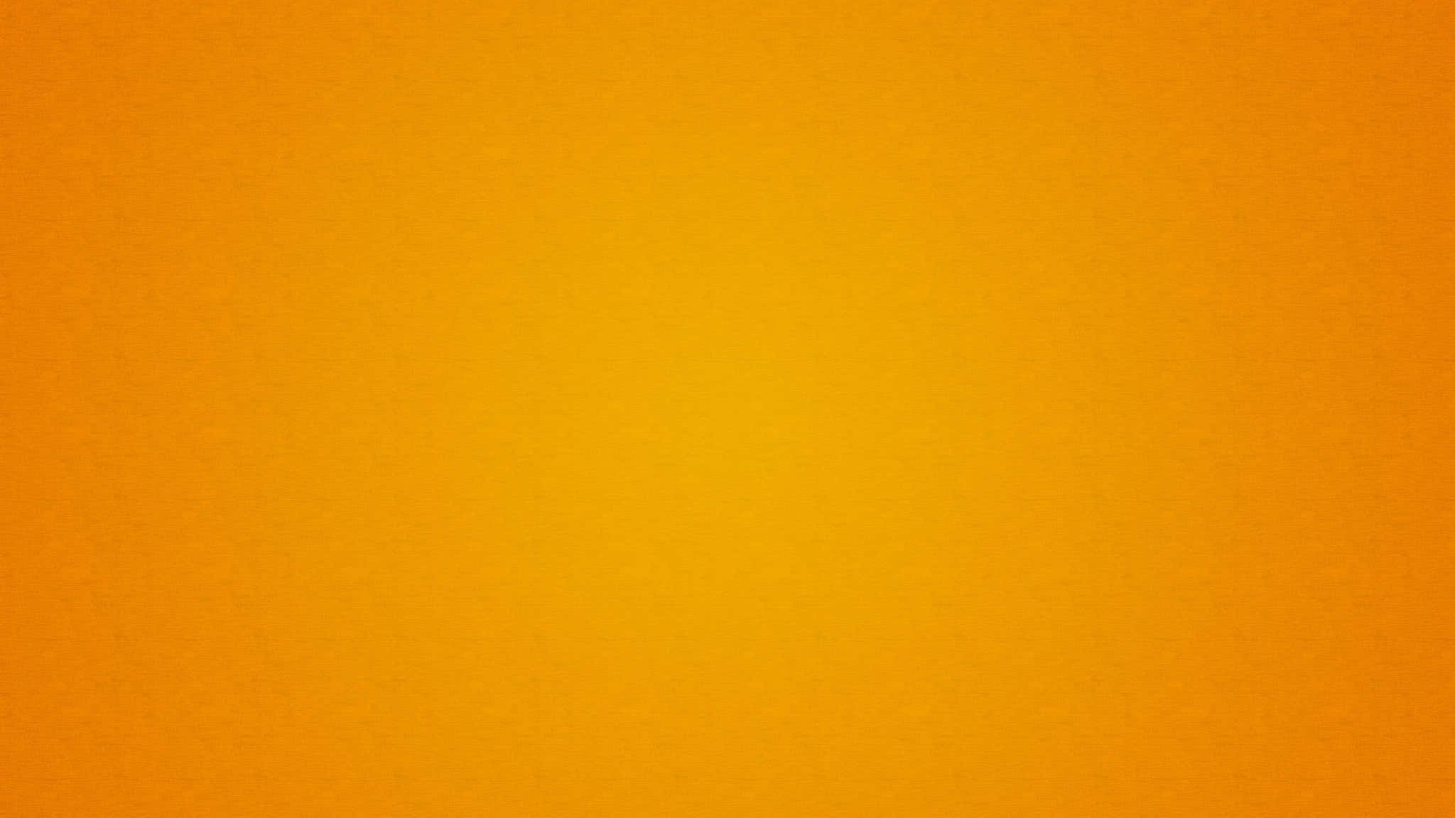 黃色紋理 桌布 壁紙 — 在帶有紋理的布料表面上，從溫暖的橙色到黃色的平滑漸變。