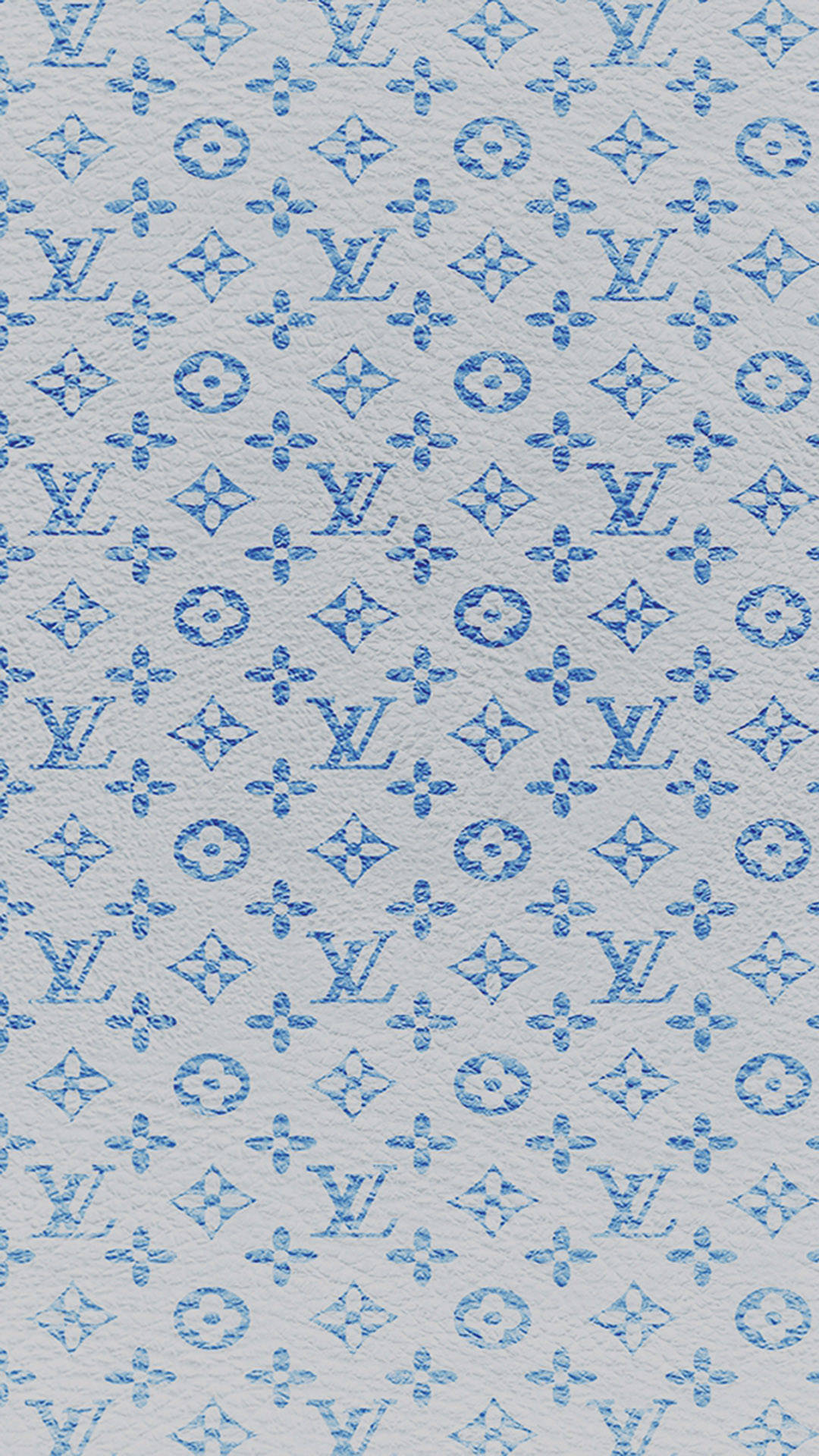 在帶有紋理的灰色布料上的藍色 Louis Vuitton 字母組合圖案。