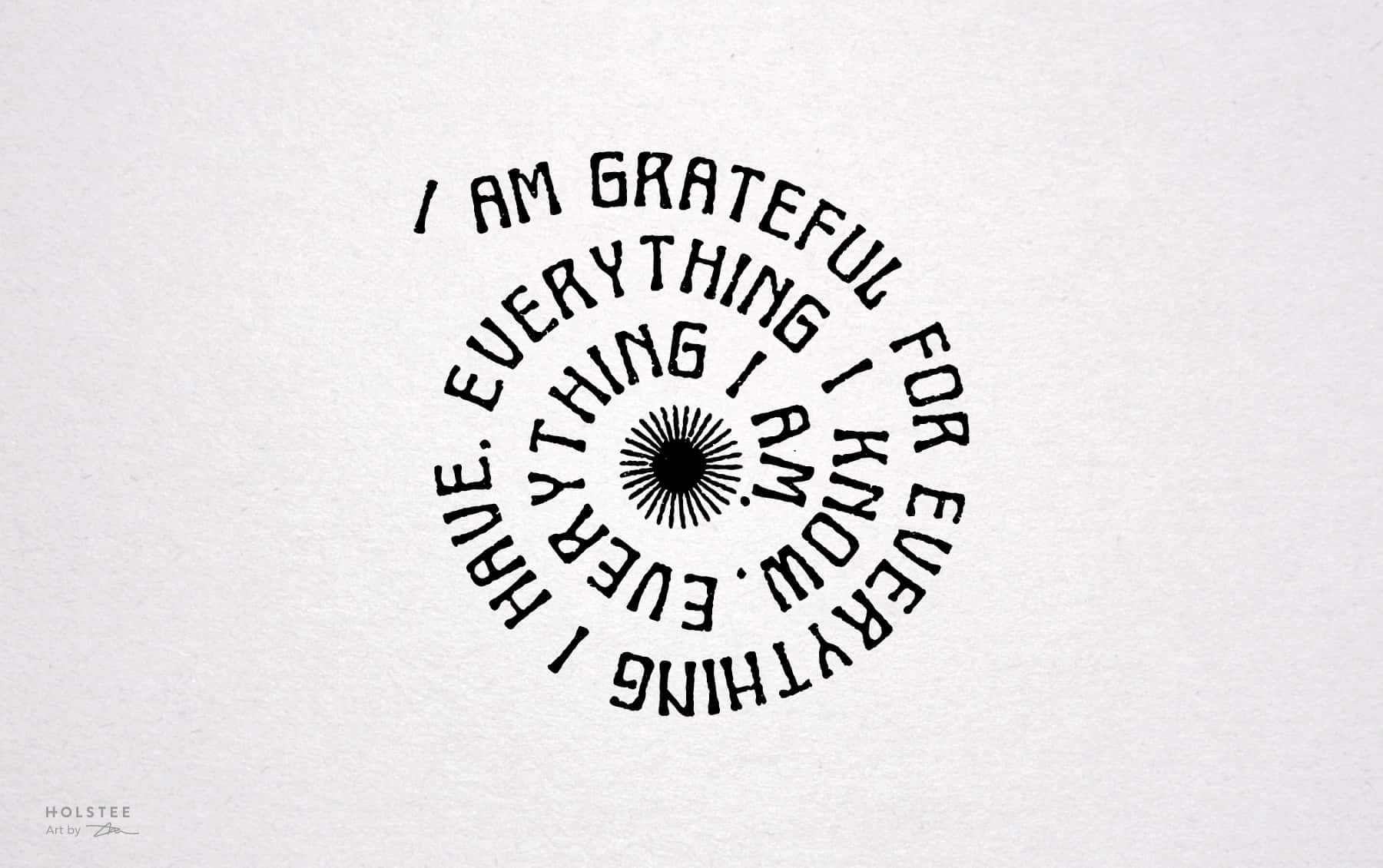 Gratitude 桌布 壁紙 — 在帶有紋理的白色紙張上，一個極簡的黑色圓形字體設計寫著「我感激我所是的一切、我擁有的一切、我所知的一切」