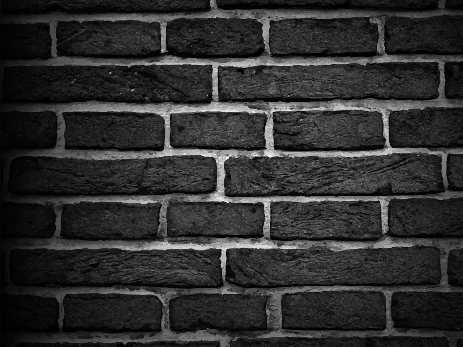 Aesthetic Black And White 桌布 壁紙 — 在戲劇性燈光下，風化黑色磚牆的近距離特寫，帶有紋理灰泥線條。