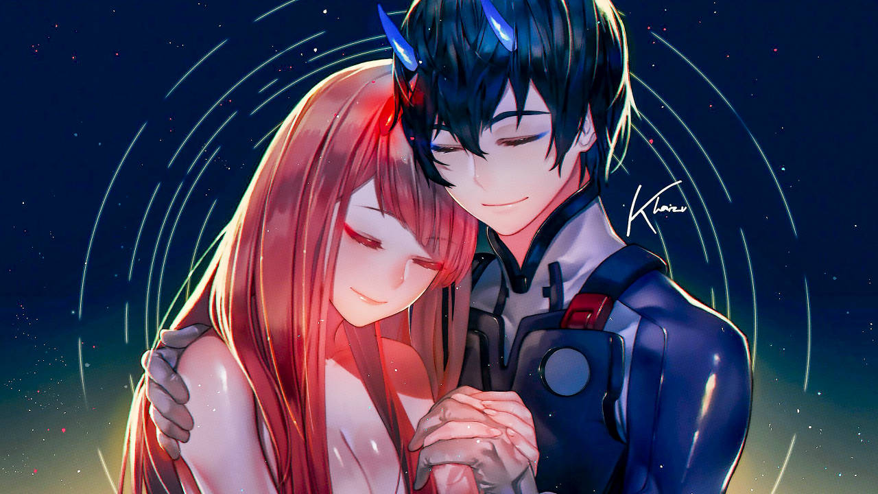Darling In The Franxx 桌布 壁紙 — 在星空下，紅髮少女與藍角少年在發光環中溫柔擁抱的動漫場景。