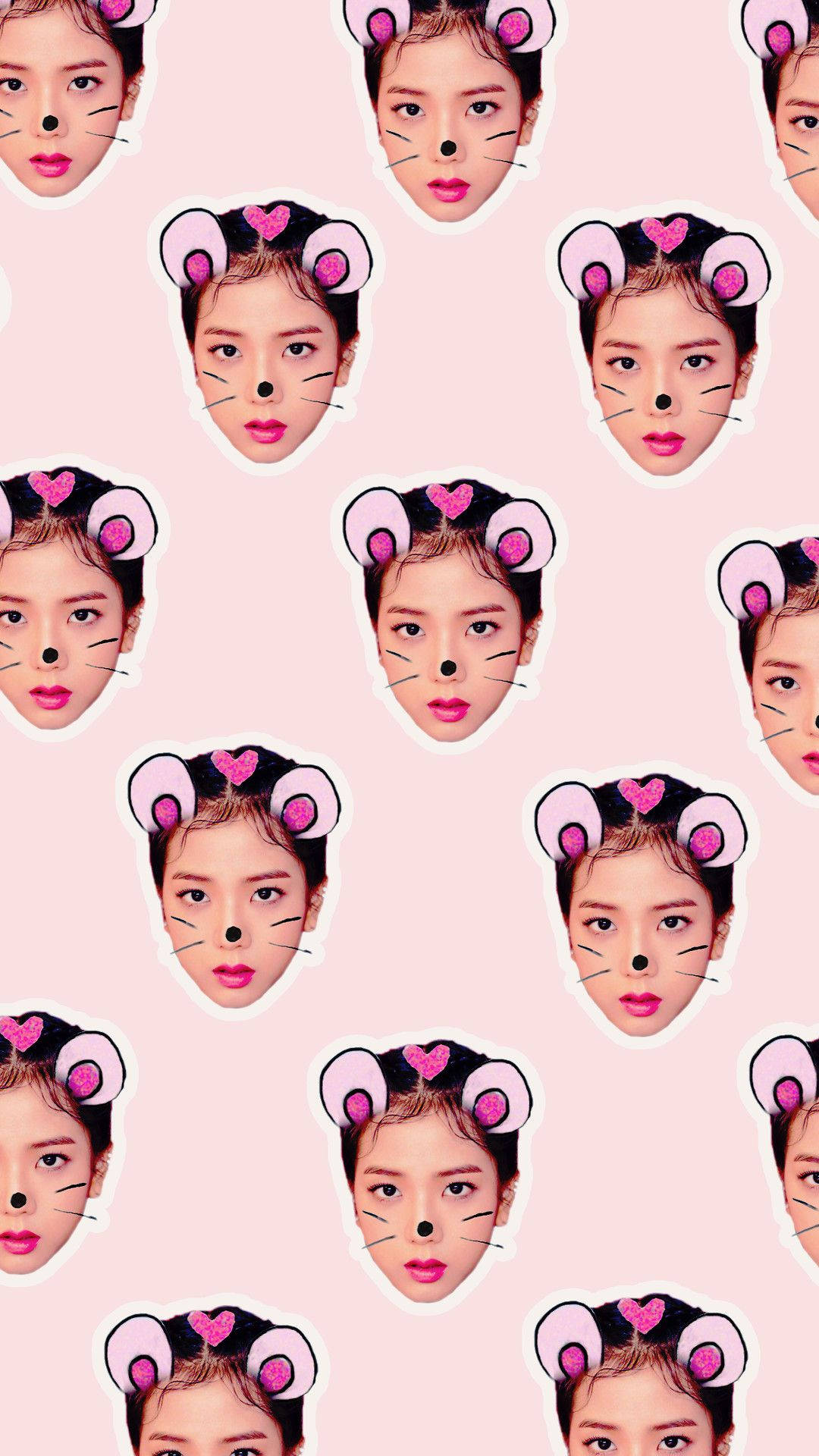 BLACKPINK 桌布 壁紙 — 在柔和的粉紅色背景上，年輕女性臉部帶有粉紅色閃亮老鼠耳朵和鬍鬚的重複圖案。