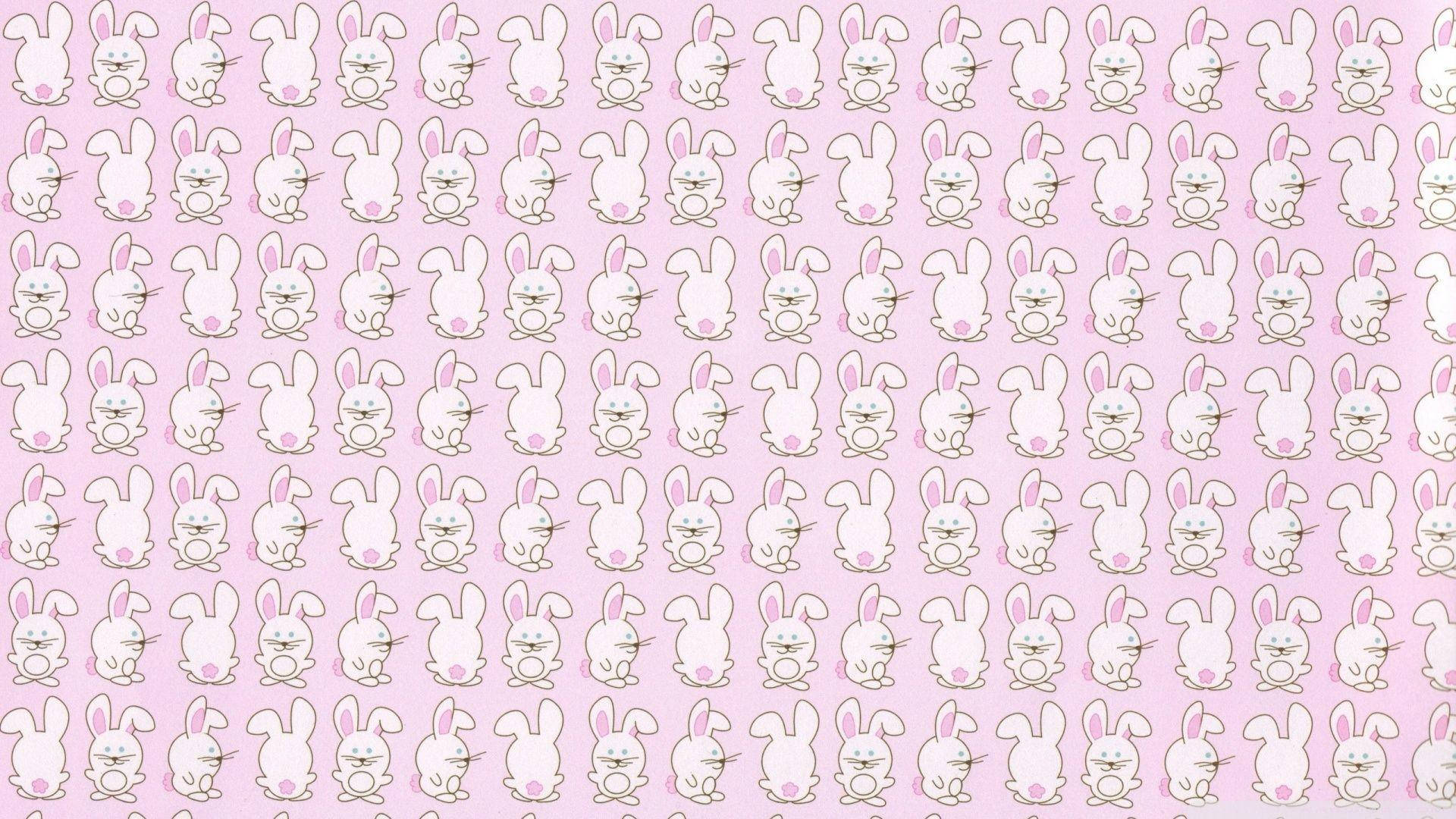Cute Simple Aesthetic Desktop 桌布 壁紙 — 在柔和的粉紅色背景上，重複的可愛白色卡通兔子圖案，帶有粉紅色耳朵和臉頰。
