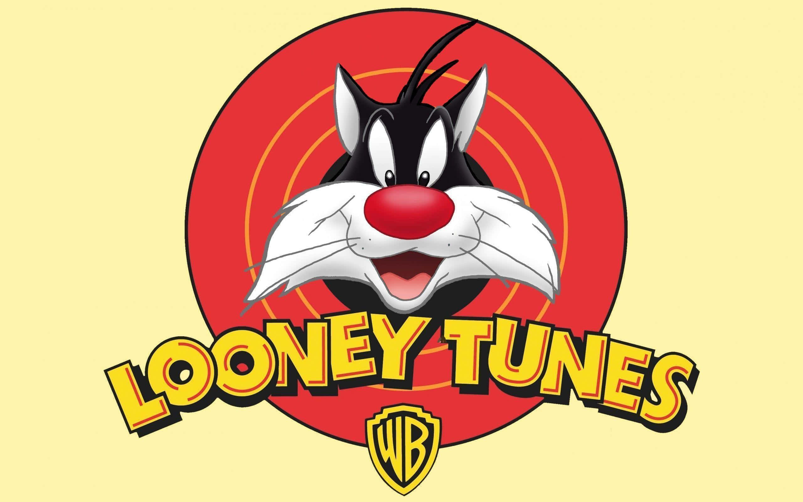 Sylvester The Cat 桌布 壁紙 — 在淡黃色背景上，紅色靶心圓圈中，傻大貓咧嘴大笑，下方有「Looney Tunes」文字。