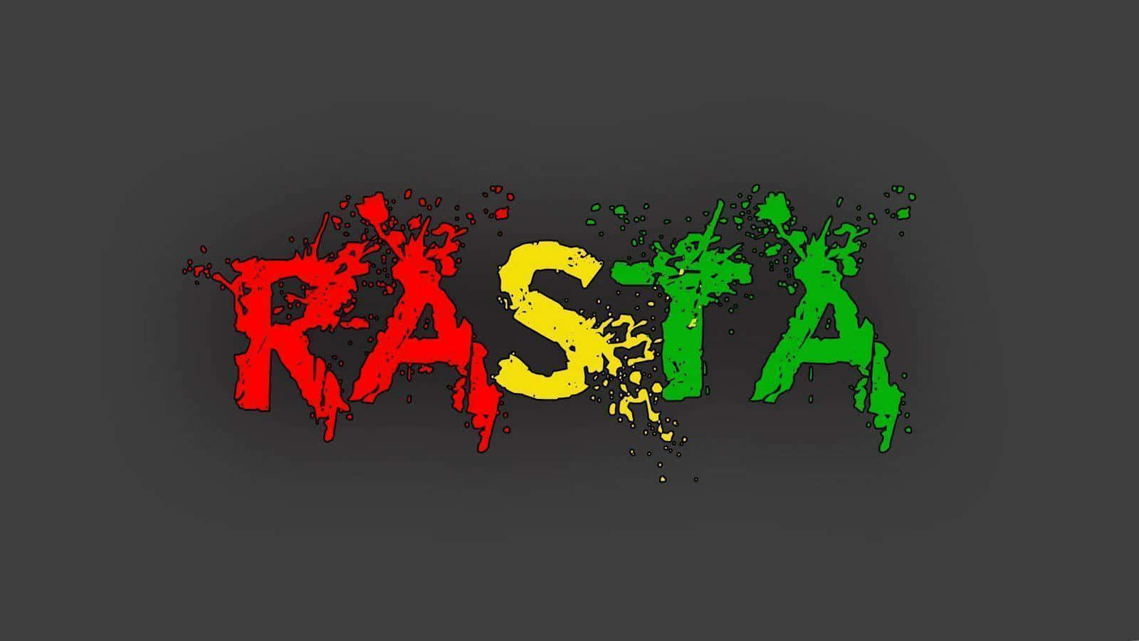 Rasta 桌布 壁紙 — 在深灰色背景上，RASTA 這個字以紅色、黃色和綠色油漆噴濺呈現。