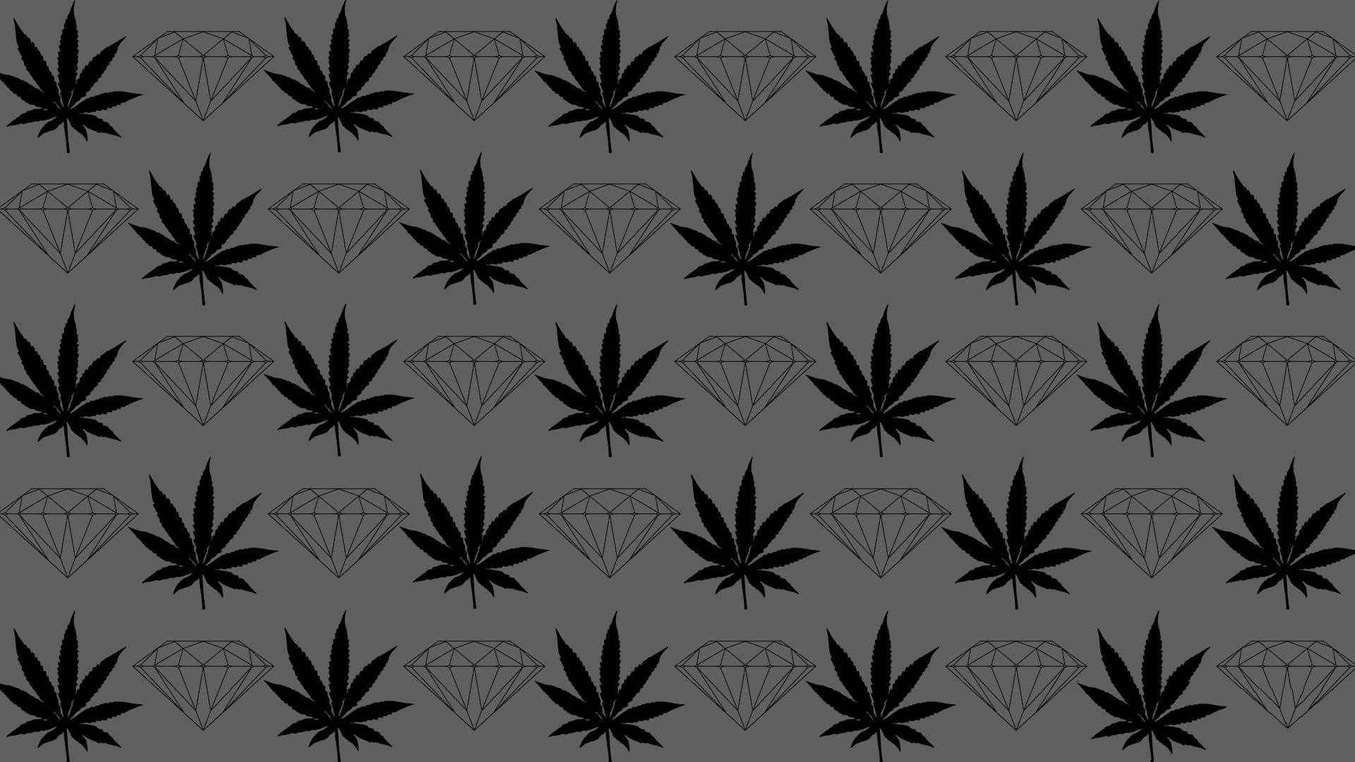 Supply 桌布 壁紙 — 在深灰色背景上重複出現的黑色大麻葉和鑽石輪廓圖案。