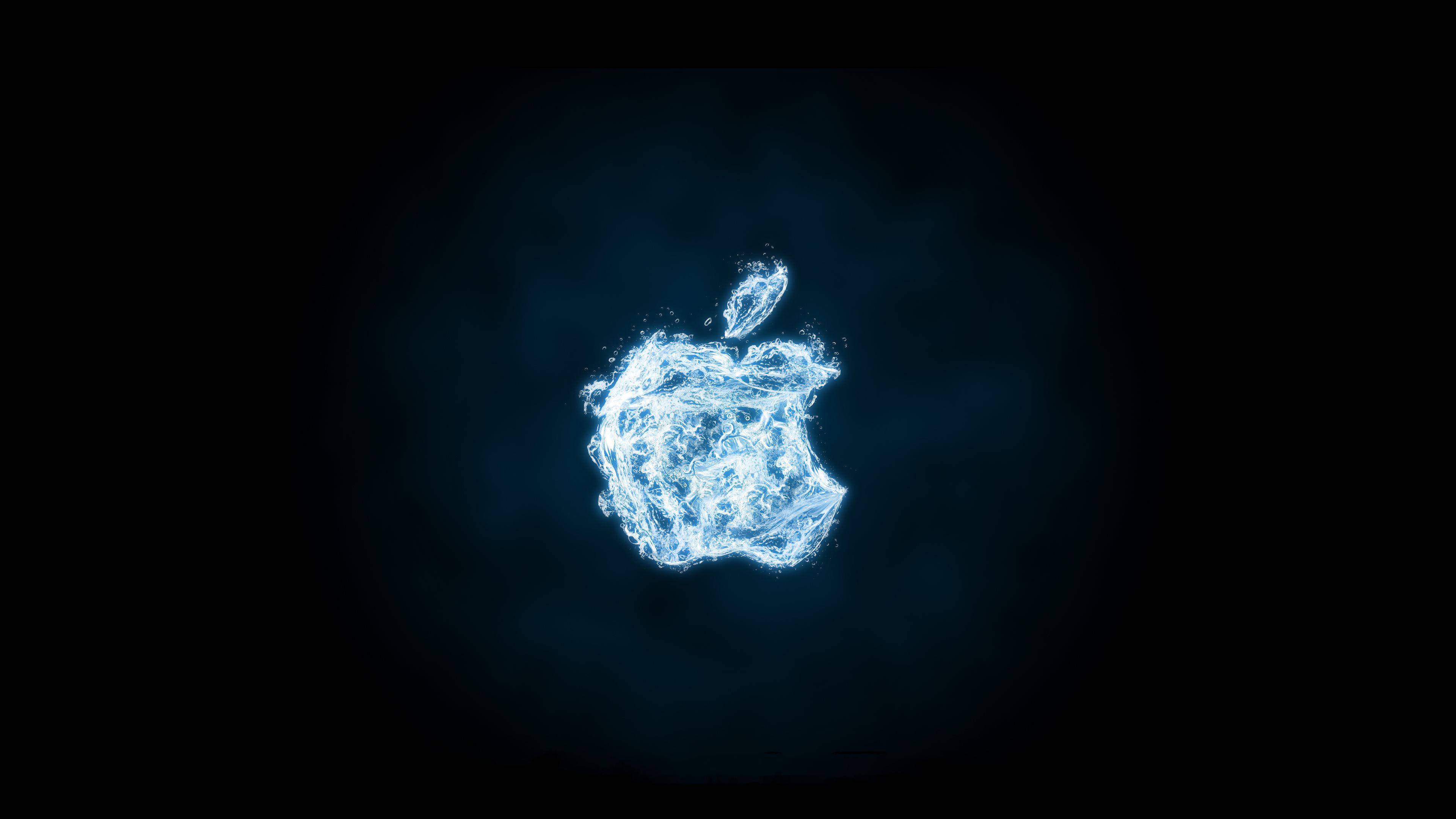 4K 桌布 壁紙 — 在深色漸變背景上，由電粒子脈衝形成的發光藍色Apple標誌。