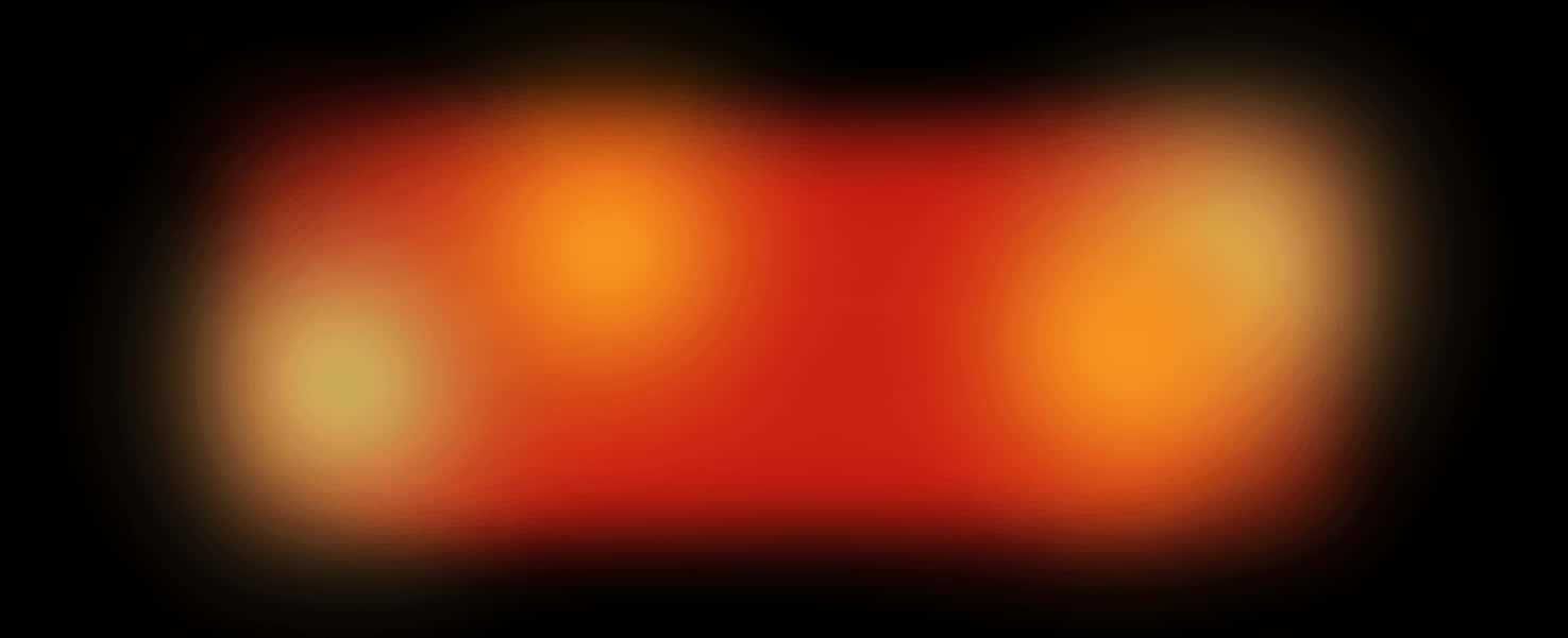 glow 桌布 壁紙 — 在深色背景上，帶有溫暖橙色和紅色色調的柔和發光抽象形狀。