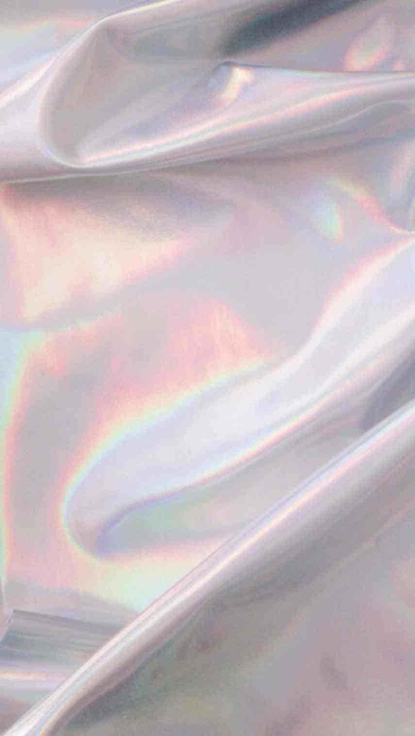 美學手機 桌布 壁紙 — 在漫射光下反射柔和彩虹色調的皺褶虹彩布料特寫。