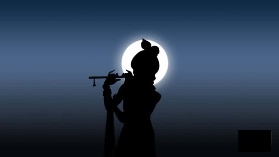 Silhouette 桌布 壁紙 — 在漸變夜空下，吹笛者的剪影映襯著發光的滿月。