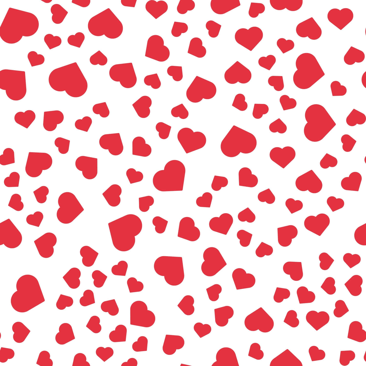 Heart Pattern 桌布 壁紙 — 在潔白背景上散落著鮮豔的紅色心形圖案，營造出俏皮浪漫的氛圍。
