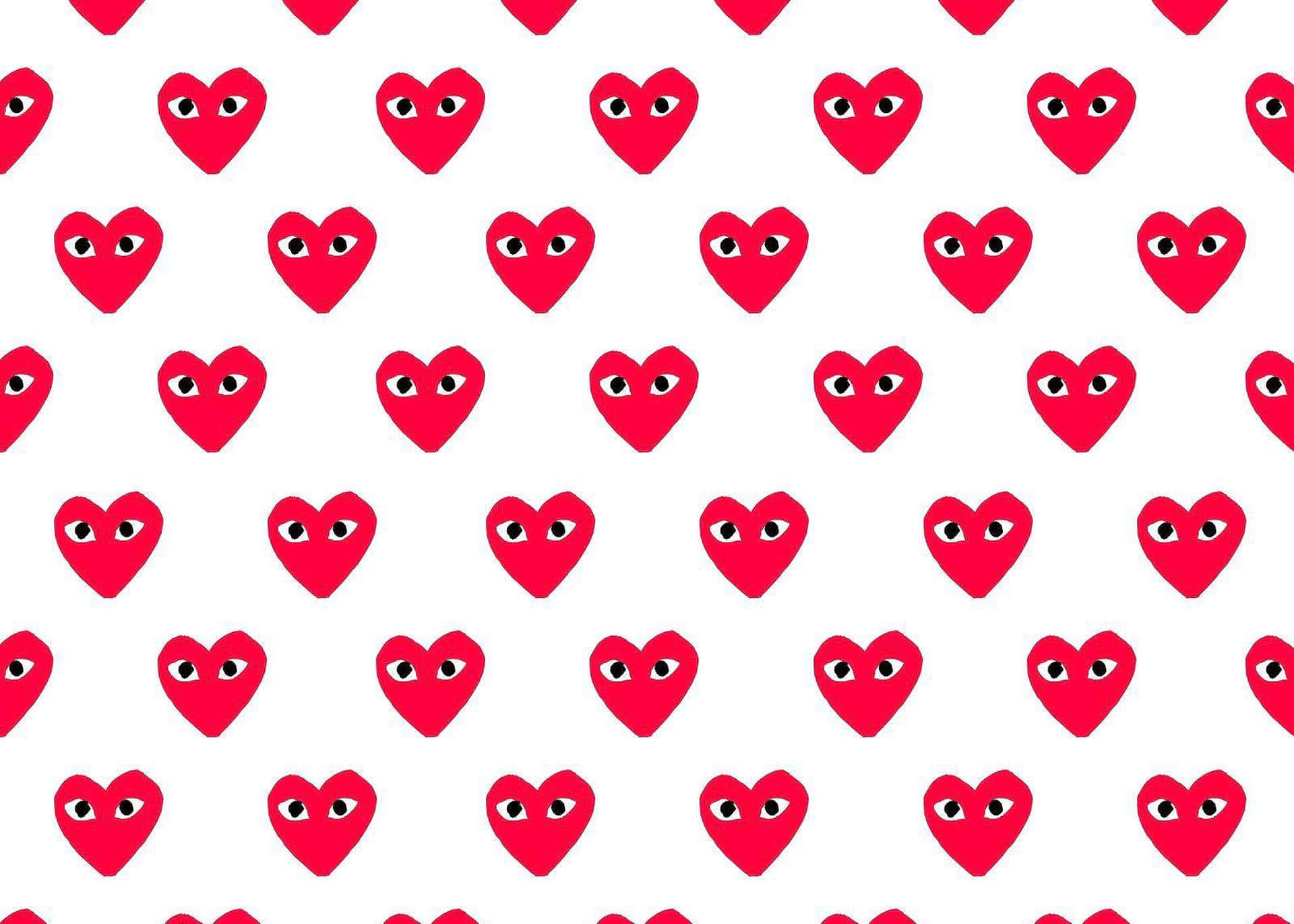 cdg 桌布 壁紙 — 在潔白背景上重複排列的鮮紅心形圖案，帶有卡通眼睛。
