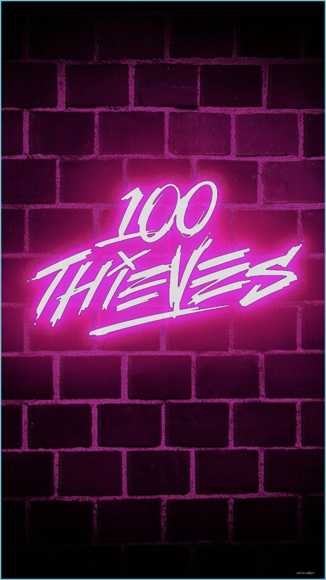 Pink Neon Aesthetic 桌布 壁紙 — 在粗獷的城市環境中，一個寫著 100 THIEVES 的鮮豔粉紅色霓虹燈牌在黑暗的磚牆上發光。
