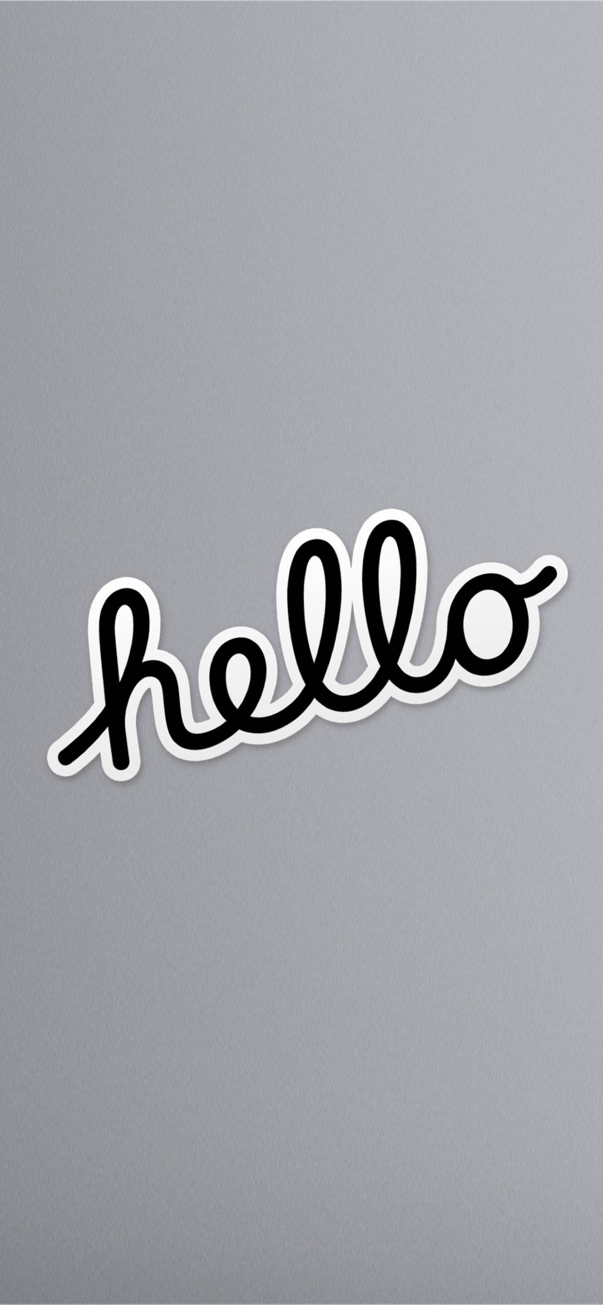 Hello 桌布 壁紙 — 在純灰色背景上，一個極簡黑色草書 'hello' 貼紙，帶有白色邊框。