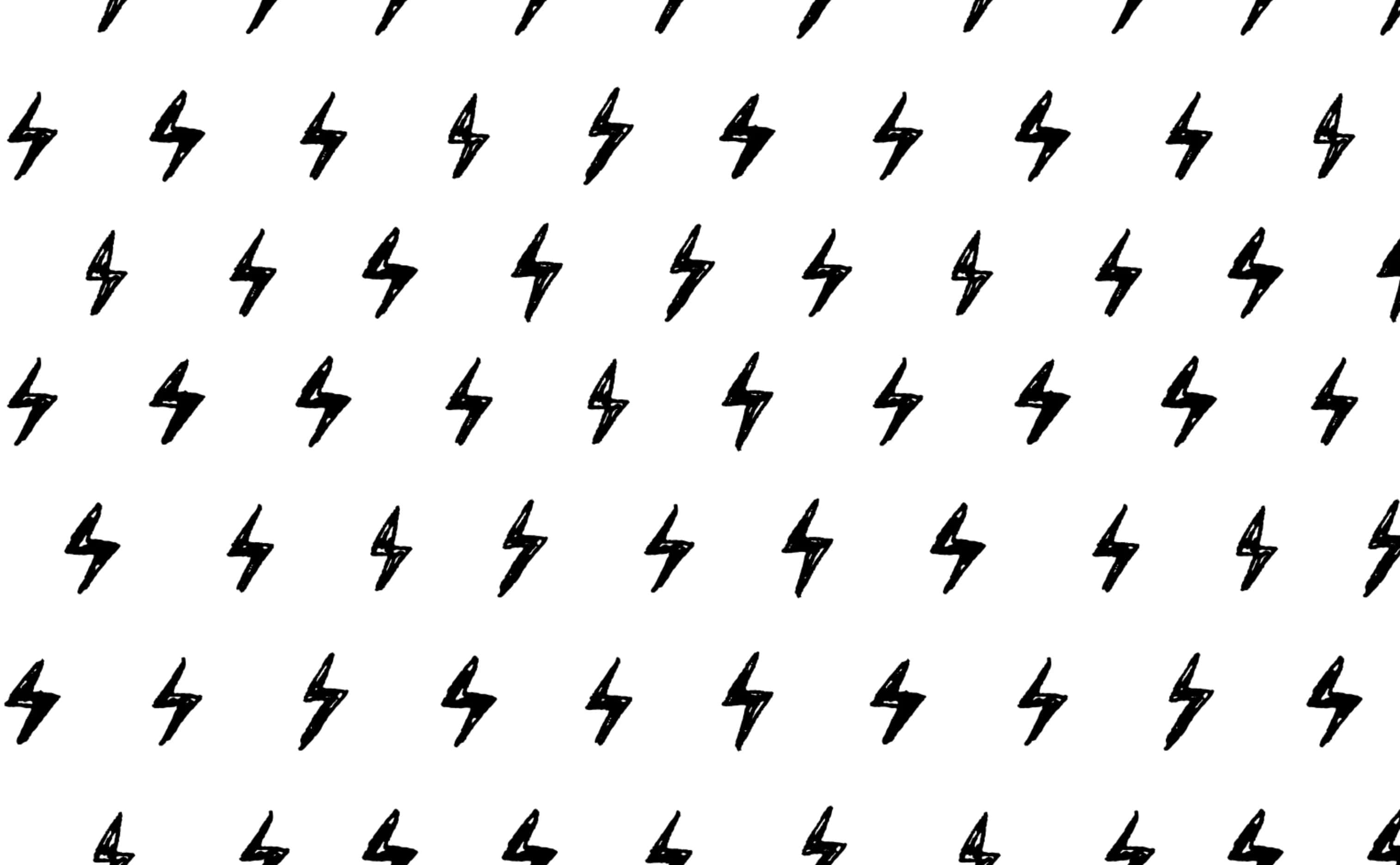 Lightning Bolt 桌布 壁紙 — 在純白背景上重複的手繪黑色閃電圖案，營造出大膽的圖形設計。