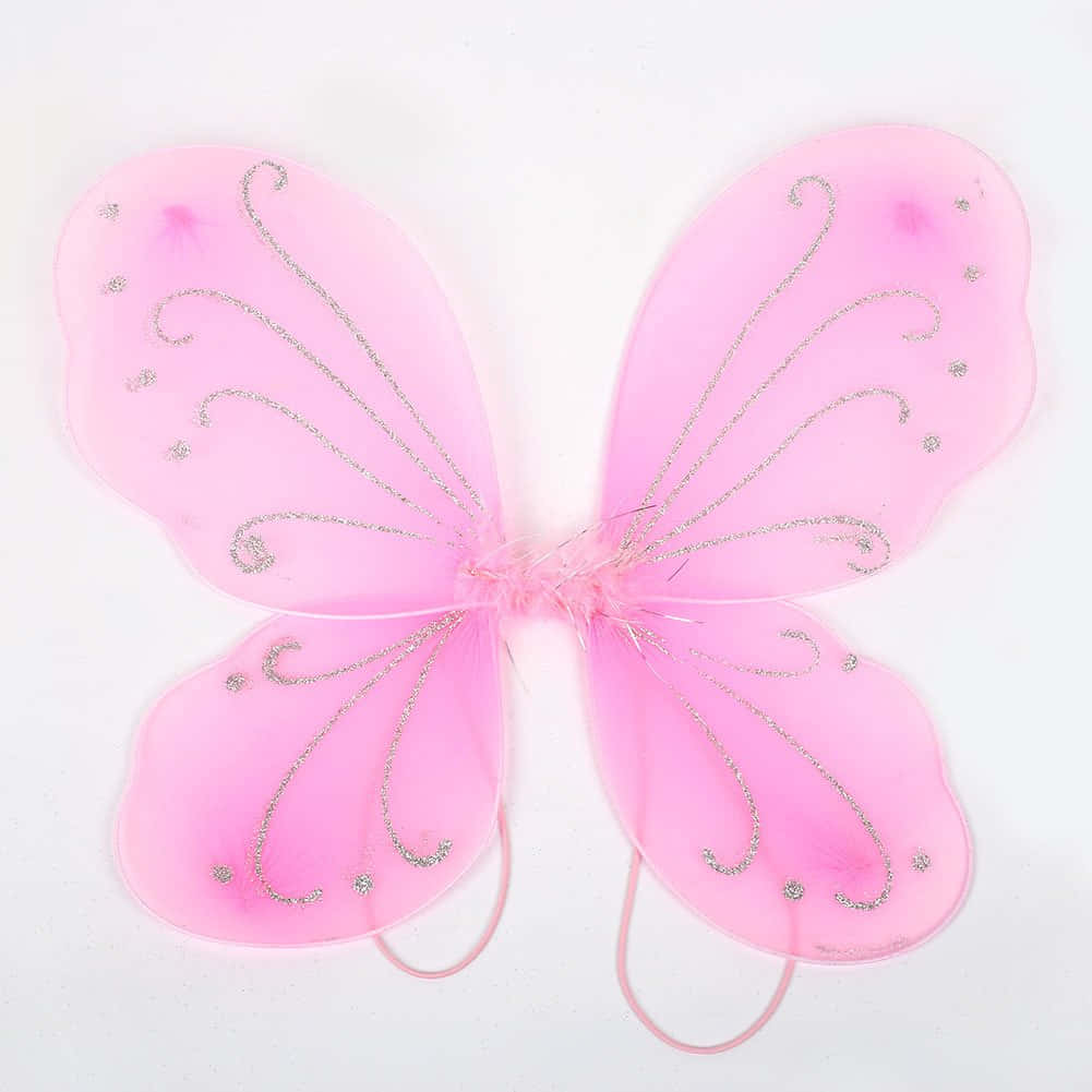 Butterfly Wing Dress 桌布 壁紙 — 在純白色背景上，帶有銀色亮粉漩渦和圓點的粉紅色精靈翅膀。