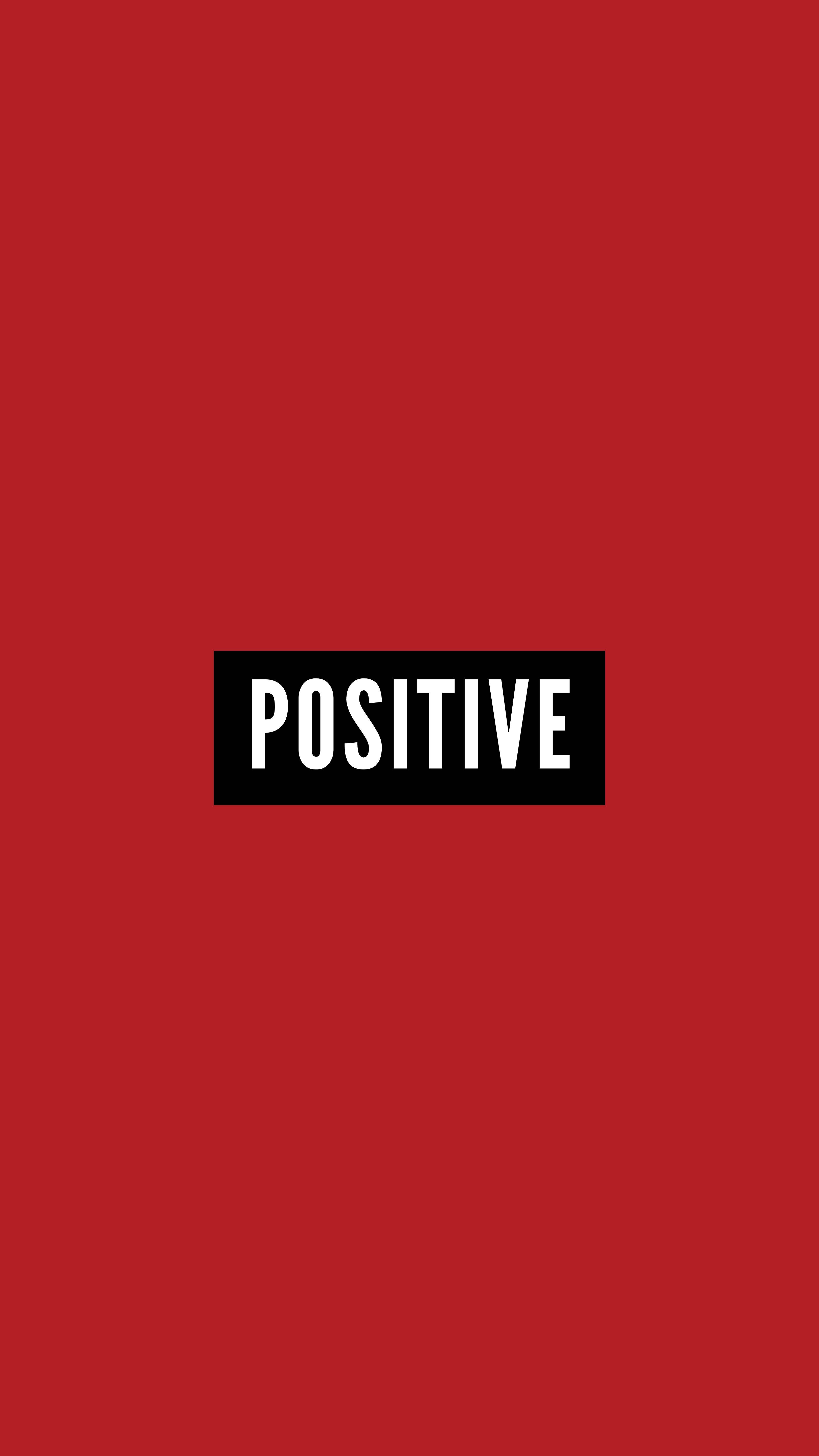 Positive 桌布 壁紙 — 在純紅色背景中央的黑色矩形內，粗體白色文字顯示「positive」。