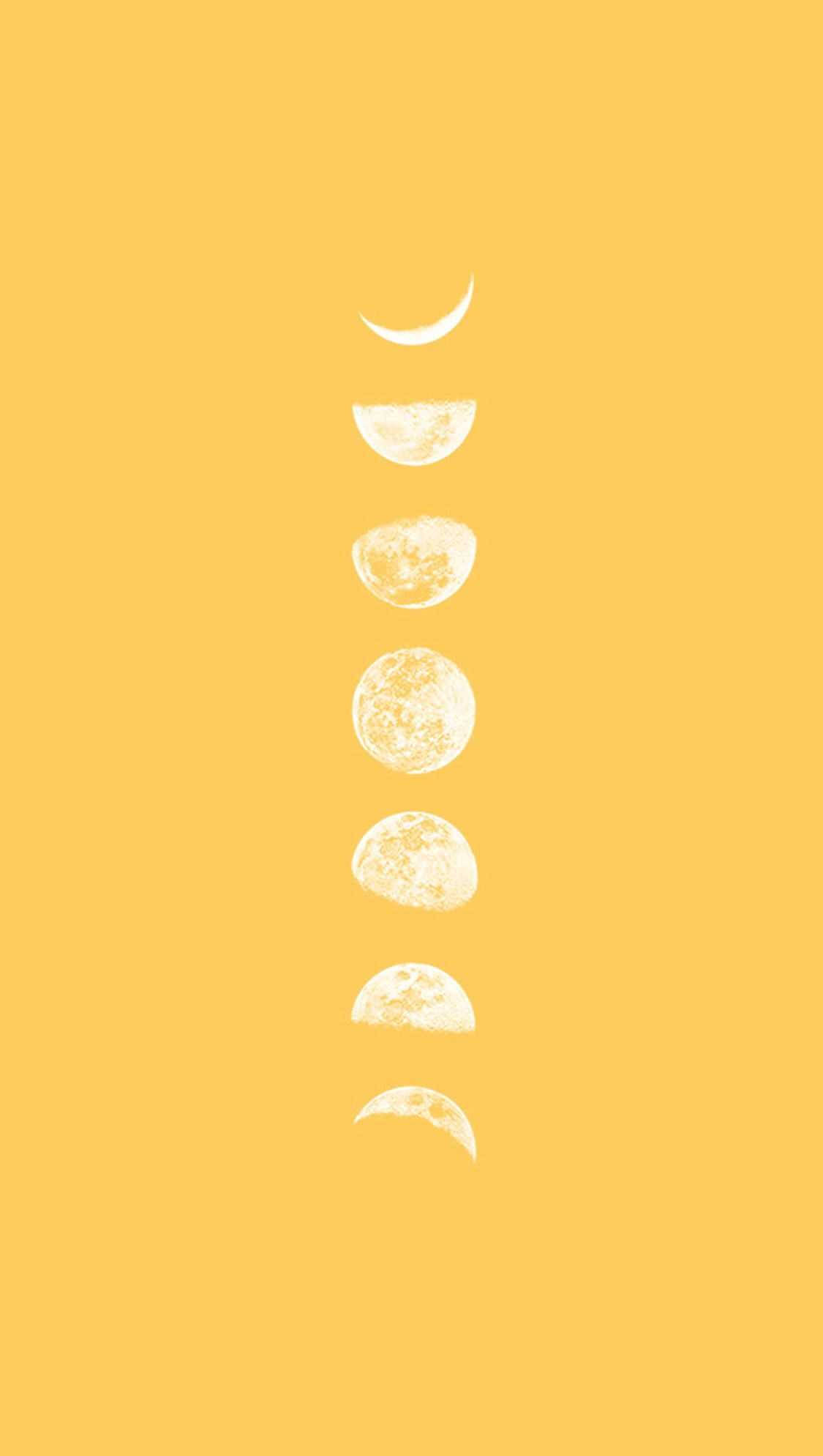 Pastel Yellow Aesthetic 桌布 壁紙 — 在純芥末黃色背景上以白色呈現的極簡垂直月相序列。