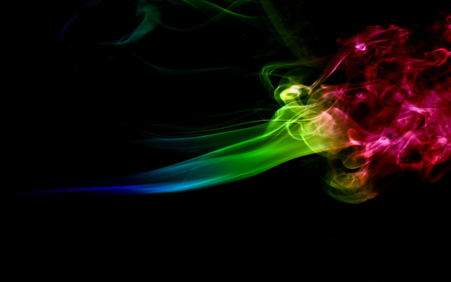 Swirl 桌布 壁紙 — 在純黑色背景上，充滿活力的霓虹煙霧呈現電光綠、粉紅和藍色的漩渦。