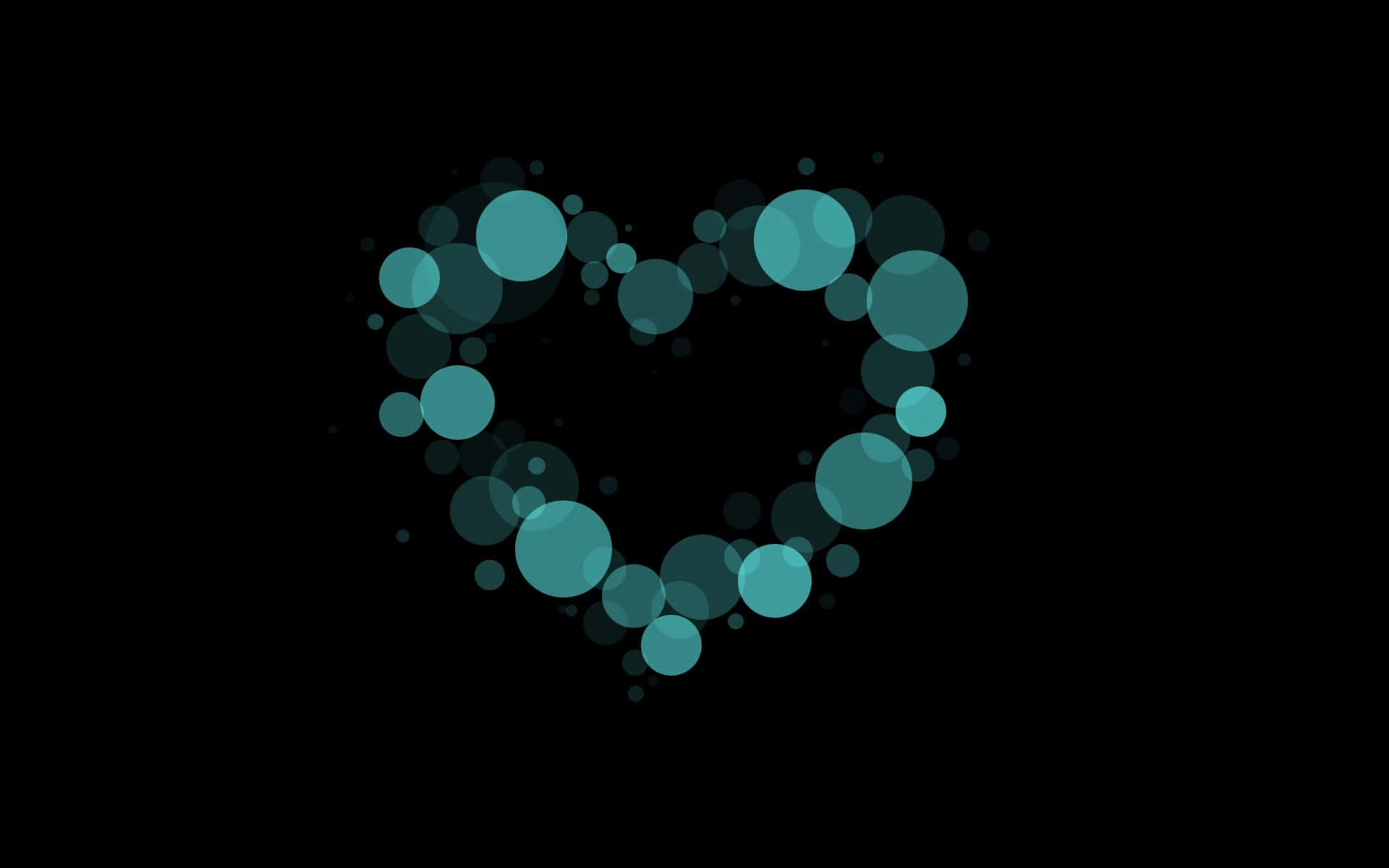 Heart Shape 桌布 壁紙 — 在純黑色背景上，由重疊的半透明圓圈形成的發光青綠色心形。