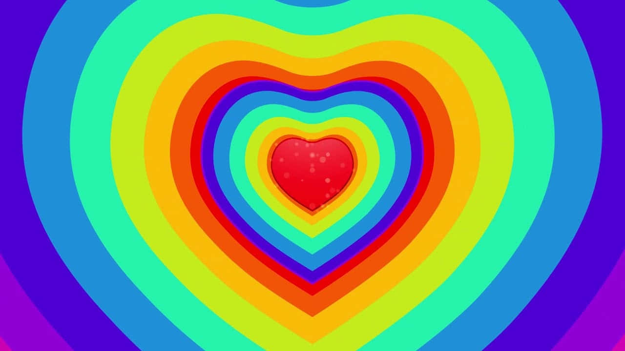 Rainbow Heart 桌布 壁紙 — 在紫色背景上，充滿活力的彩虹色同心心形從發光的紅色核心向外輻射。