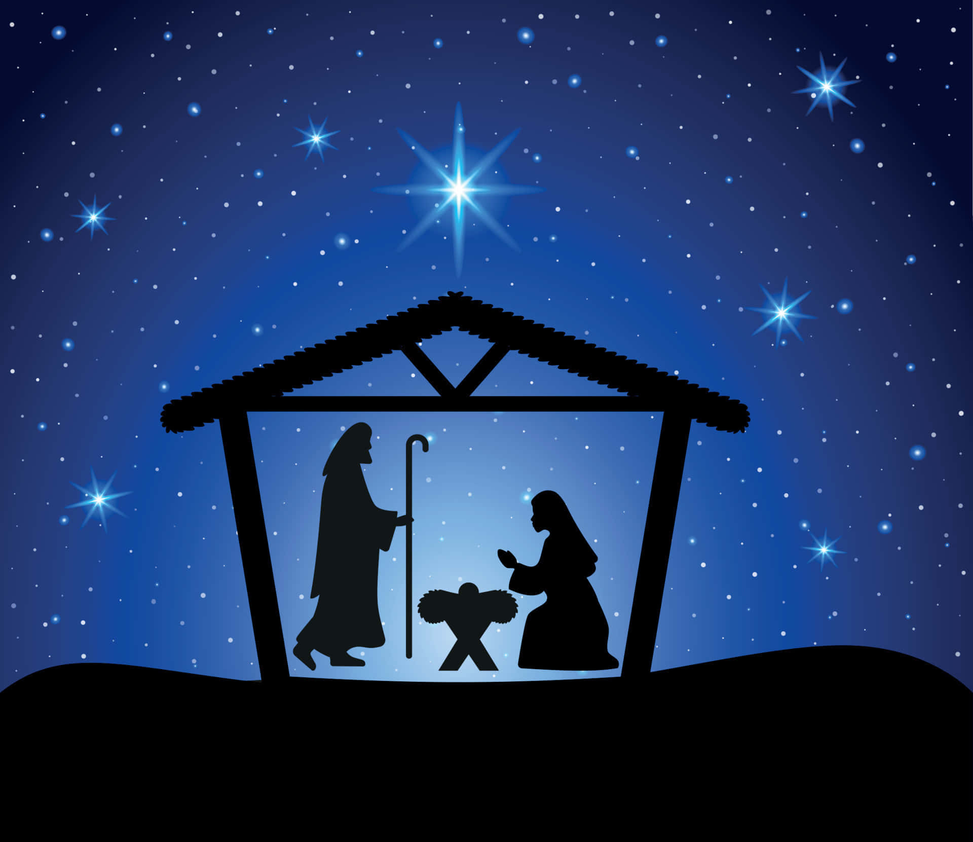Religious Christmas 桌布 壁紙 — 在繁星點點的夜空下，馬槽上方有一顆明亮的星星，剪影般的耶穌誕生場景。